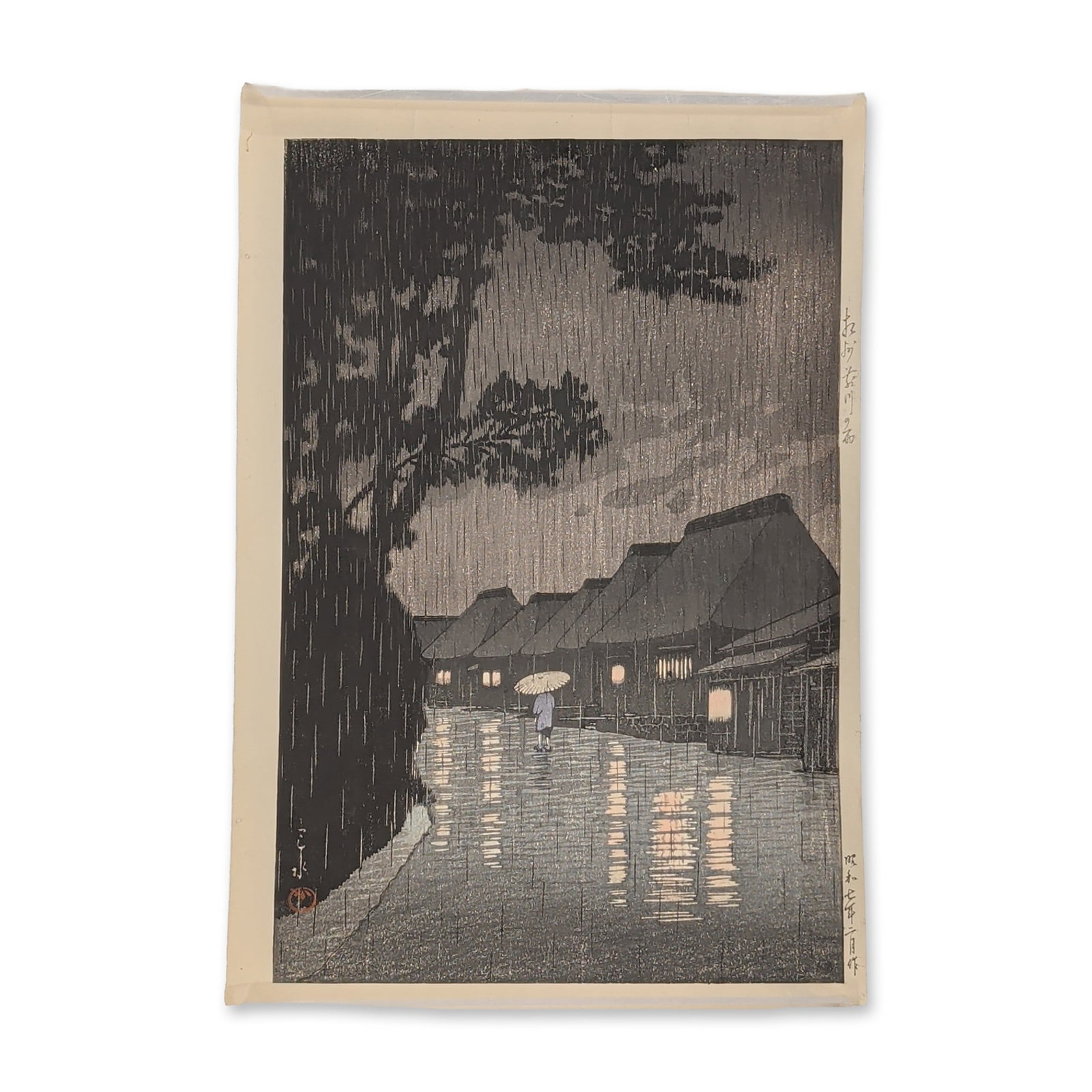 Kawase Hasui (Japanese, 1883-1957), Color Woodcut on Paper, Rain at Omagari: Utagawa Hiroshige (Japanese, 1797-1858) polychrome woodblock print (nishiki-e) on paper titled Kyoto: Sanjo Ohashi. The image depicts travelers crossing the Sanjo Great Bridge over the Kamo River with