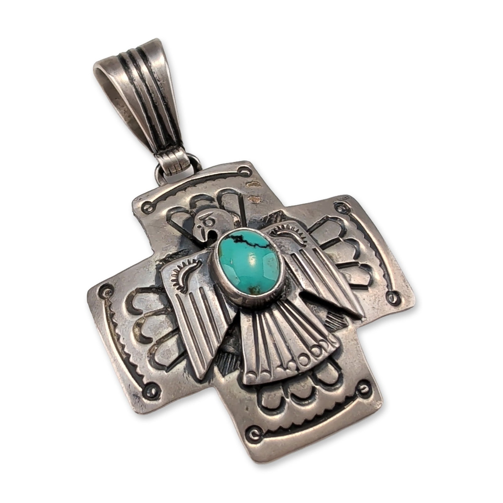 Emer Thompson Navajo Sterling Silver Turquoise Thunderbird Pendant: Jerusalem style pendant in sterling silver, featuring intricate granulation and filigree-style ornamentation. The obverse features a central floral boss and four cross-crosslets. The reverse contains 