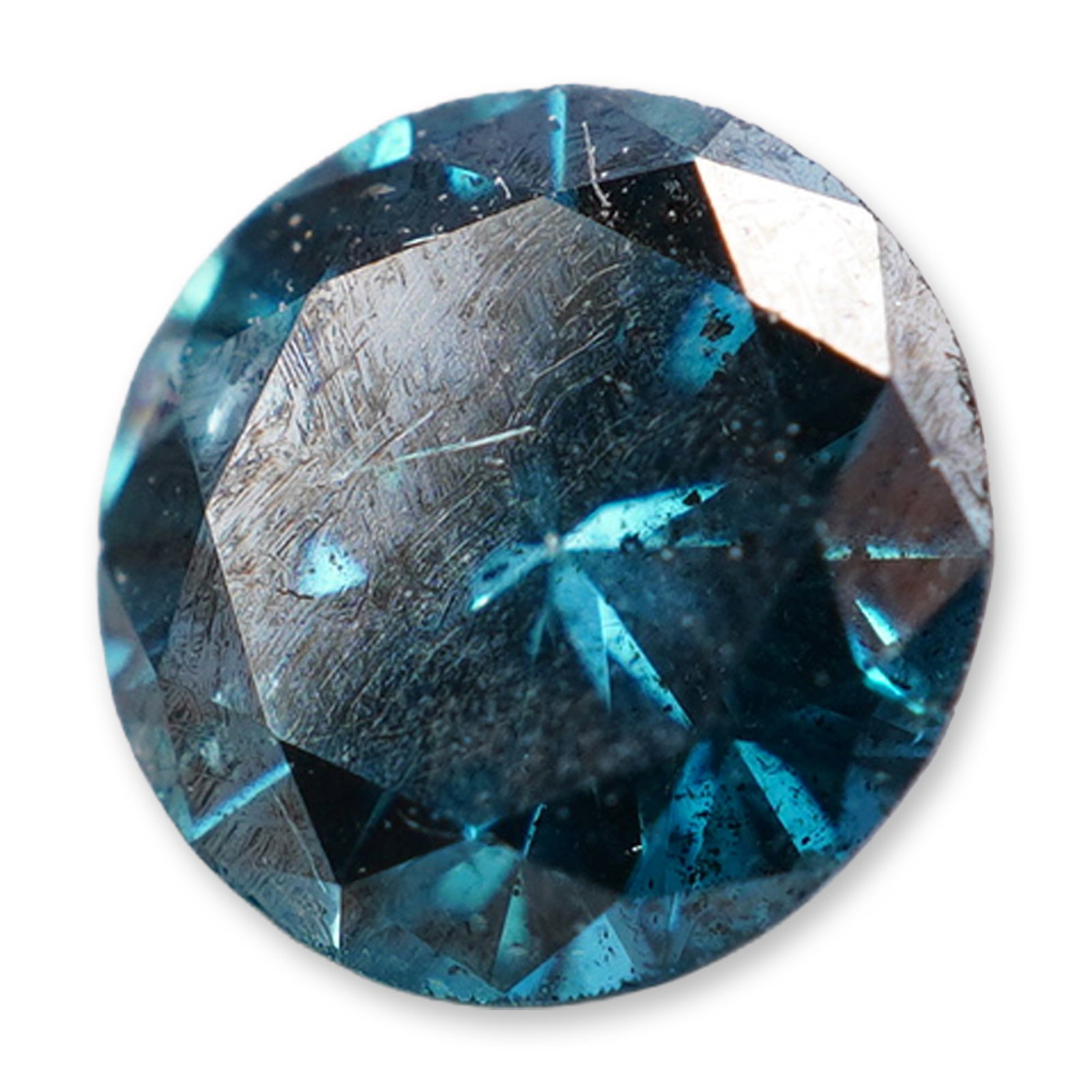 Round Brilliant Cut Blue Diamond: Round brilliant cut loose diamond featuring a deep teal blue color. The gemstone displays transparent clarity with visible internal characteristics. .3ct