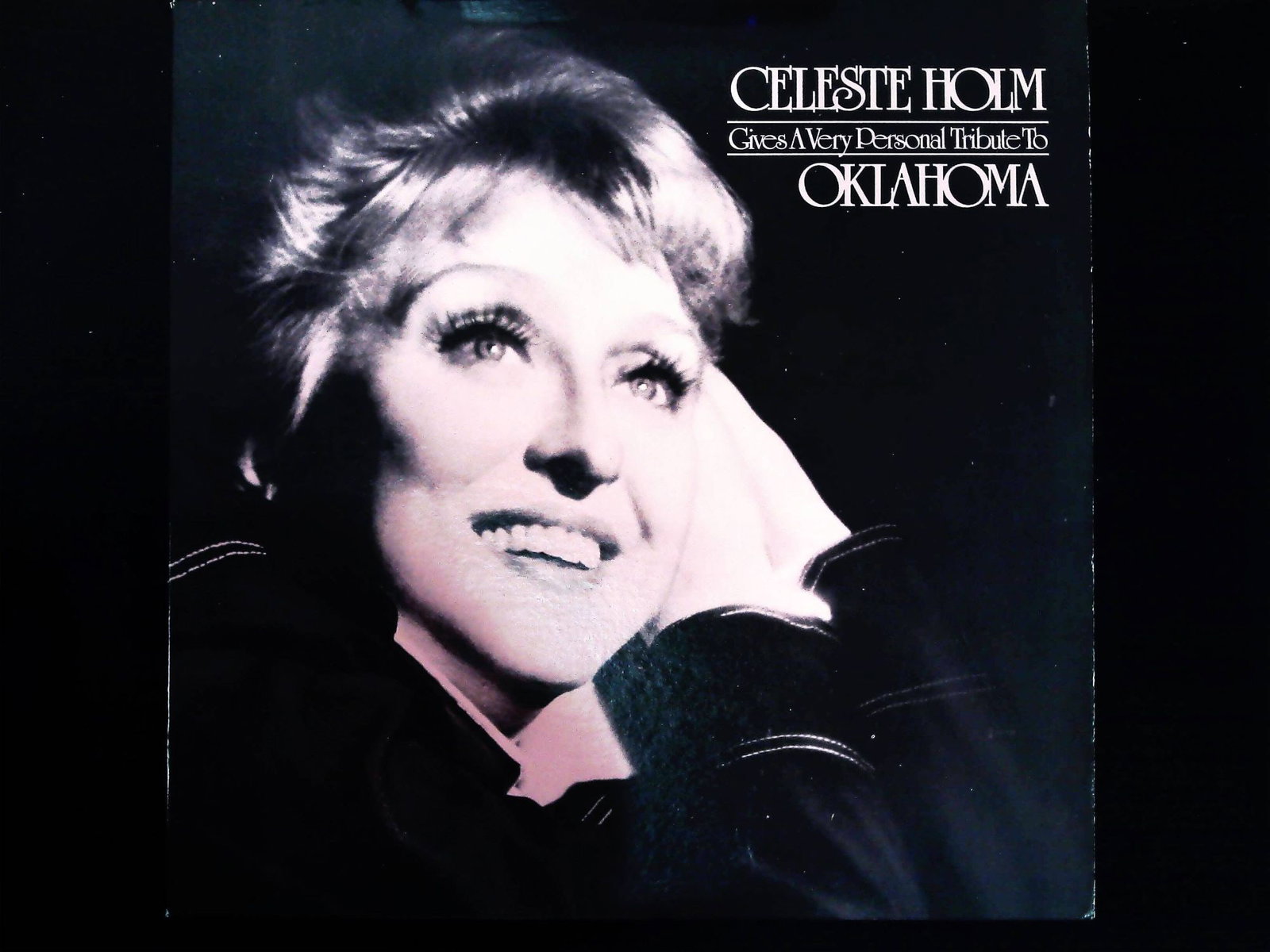 Celeste Holm Gives A Very Personal Tribute To Oklahoma Vinyl LP Record (P) 1981: A single vinyl LP record album featuring Celeste Holm's Gives A Very Personal Tribute To Oklahoma. The album was released by Original Cast Records under catalog number OC 8129 STEREO, bearing a copyri