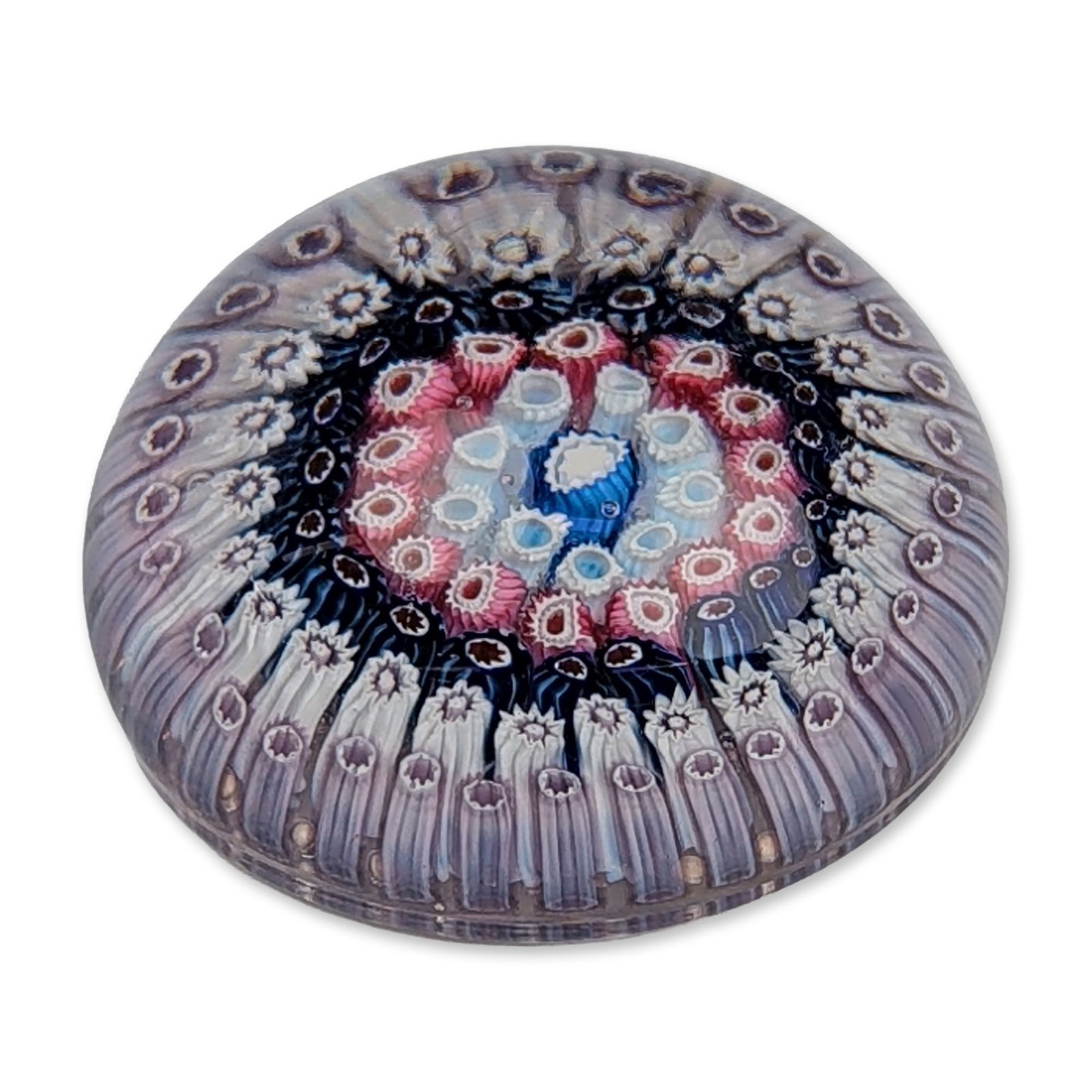 Antique Whitefriars Concentric Millefiori Paperweight: Baccarat, France, circa 1970. Faceted double-overlay paperweight in clear and colored glass, featuring a white sulphide profile of Pope John XXIII on a dark red basee. The yellow and white glass casin