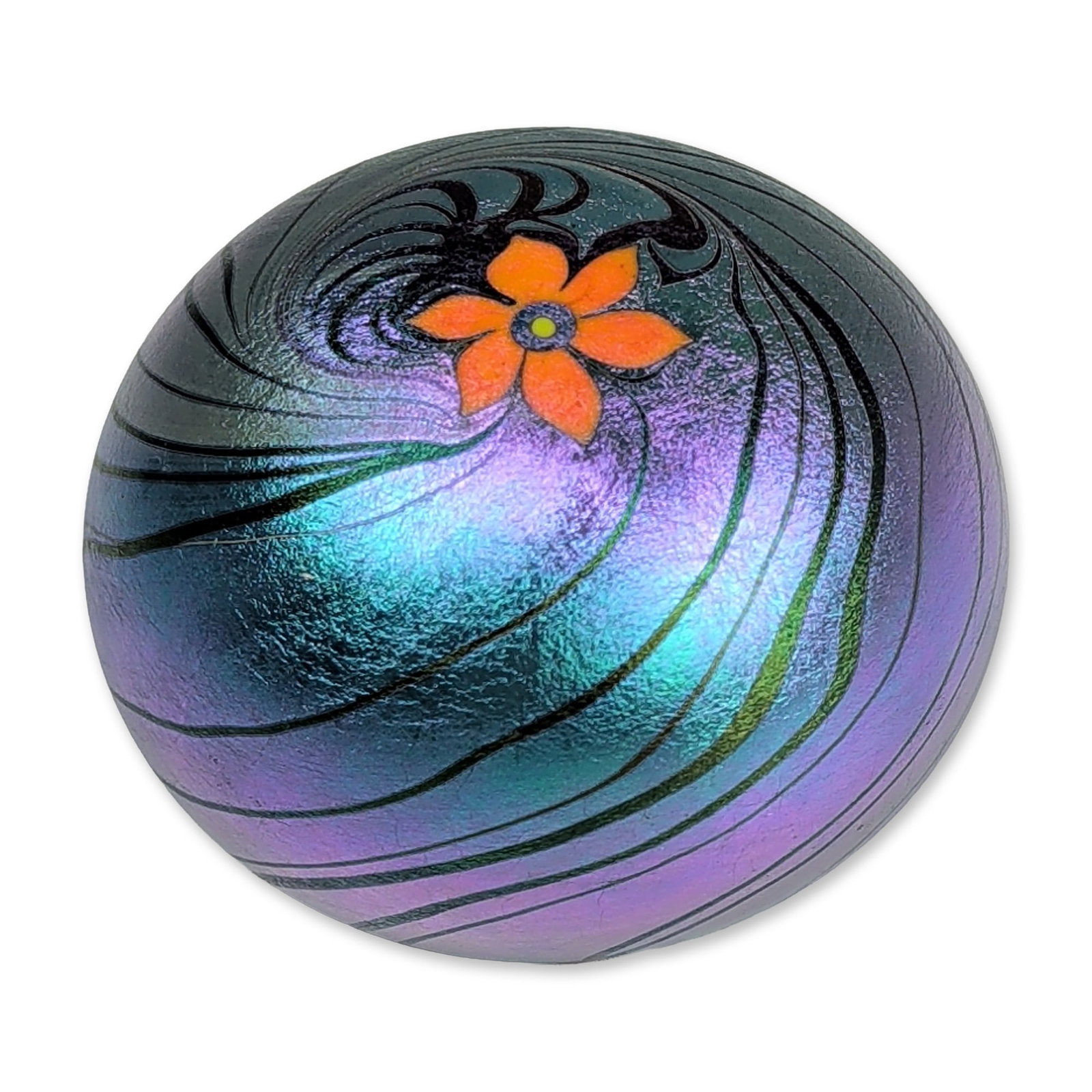 Lundberg Studios Blue Iridescent Glass Paperweight: Lundberg Studios art glass paperweight, 1974. Spherical form with a lustrous fumed iridescent surface in shifting tones of violet, cobalt blue, and emerald green. The crown is decorated with a single 