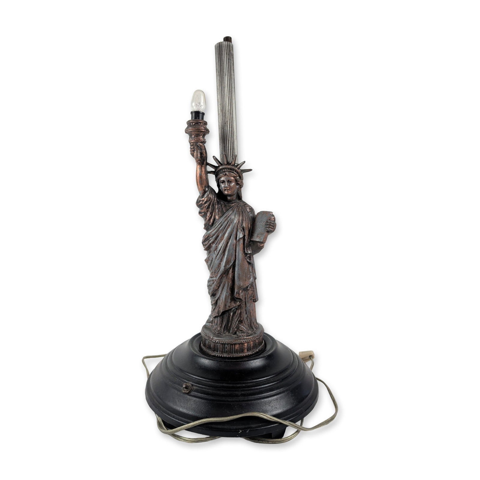 Art Deco Style Spelter Statue of Liberty Table Lamp Base: Art Deco style figural table lamp featuring a cast spelter Statue of Liberty with a bronze-toned finish. The figure is mounted on a tiered circular cast iron base with a black finish and a toggle swit