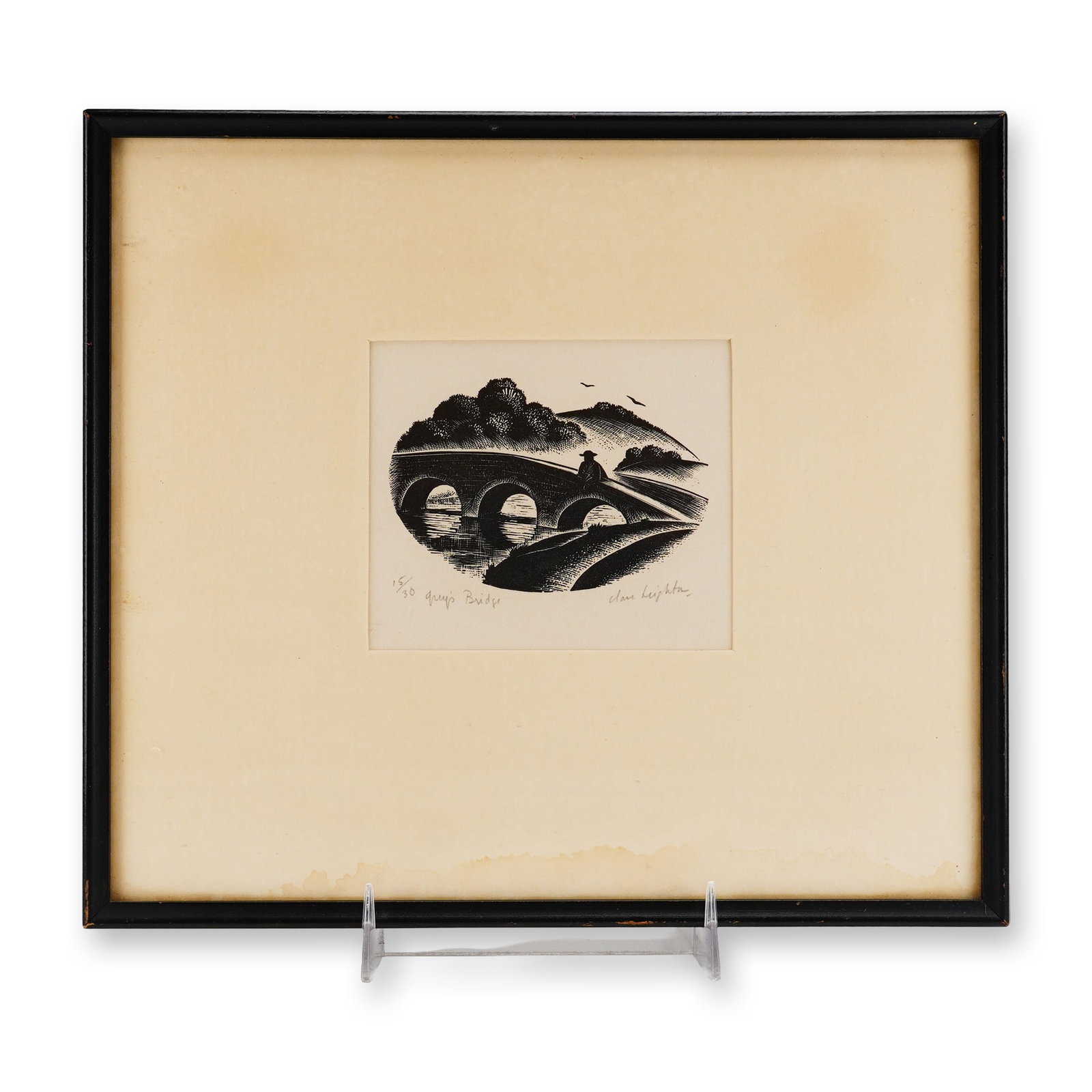Clare Leighton, Grey's Bridge, Signed Wood Engraving 15/30: This wood engraving by artist Clare Leighton (1898??"1989) is titled Grey's Bridge and depicts a solitary, hatted figure seated upon a three-arched stone bridge over a river. The composition is set wi