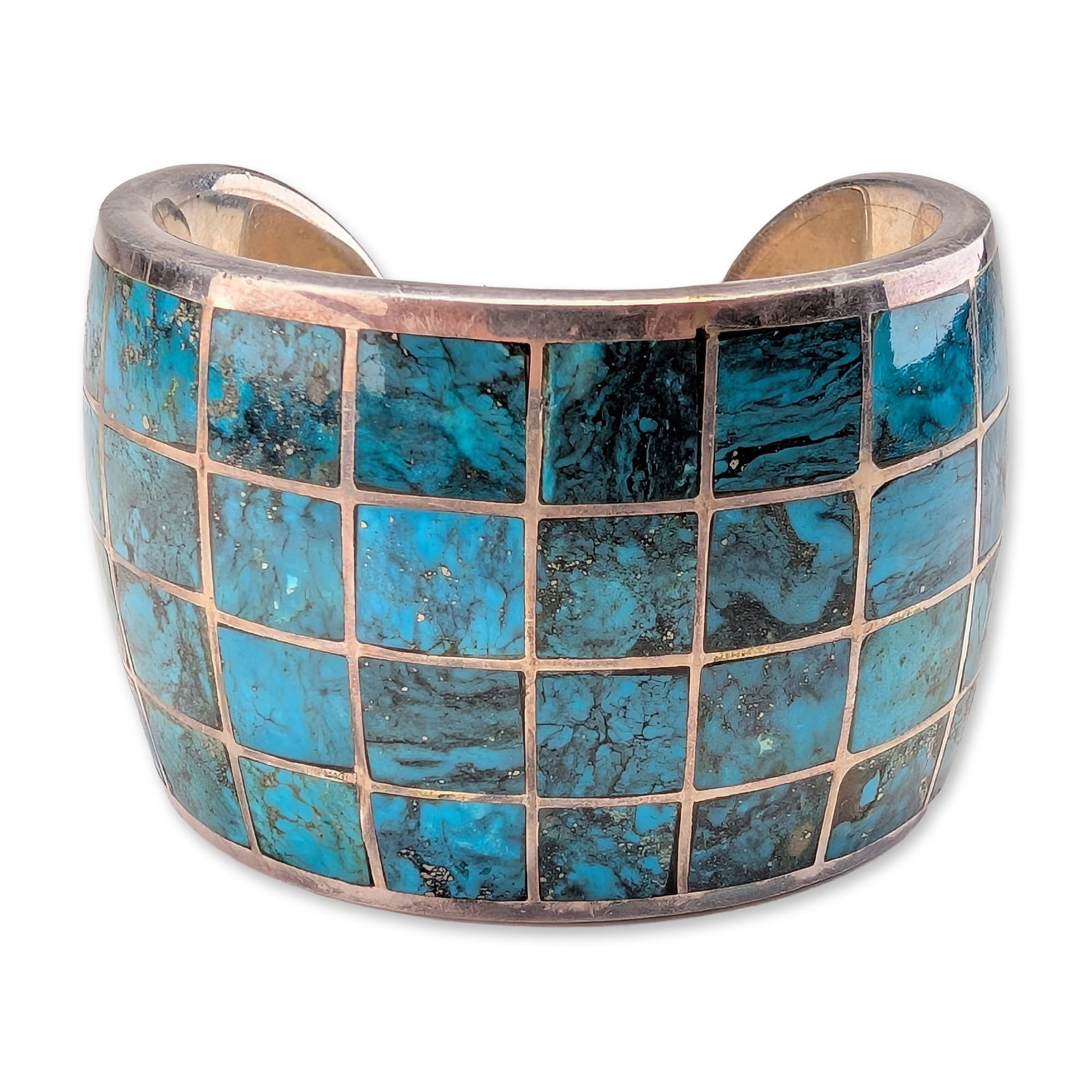 Federico Jimenez Southwestern Sterling Silver and Turquoise Inlay Cuff Bracelet: This David Yurman wide cuff bracelet is designed in the signature Sculpted Cable pattern. The piece is constructed from sterling silver, which has been verified through testing with a Thermo Scientifi