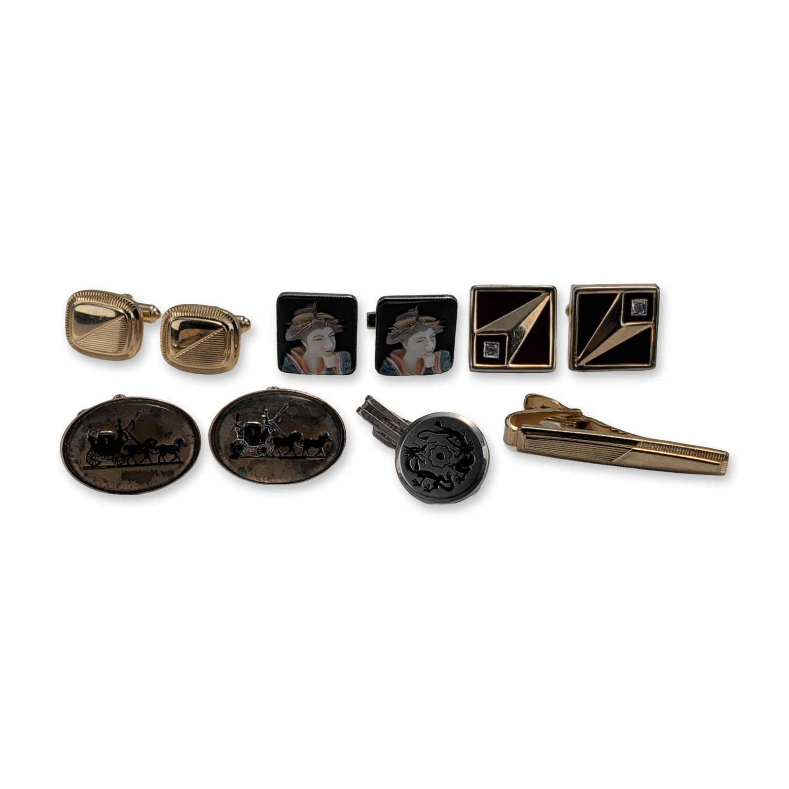 10pc Collection of Vintage Men's Cufflinks and Tie Clips: Collection of vintage men's accessories in assorted gold-tone and silver-tone base metals. The grouping features four pairs of cufflinks including oval examples with a horse and carriage motif and squ