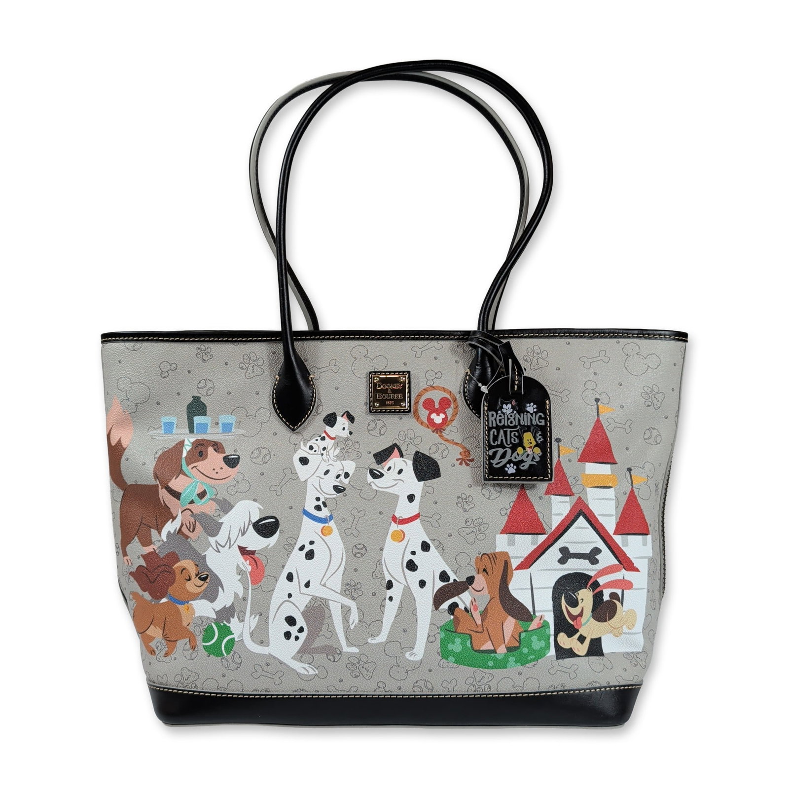 Disney x Dooney and Bourke Reigning Dogs Tote Bag: Disney and Dooney and Bourke collaborative tote bag from the Reigning Cats and Dogs collection. Crafted in coated cotton canvas with black leather trim and dual shoulder straps. The light gray