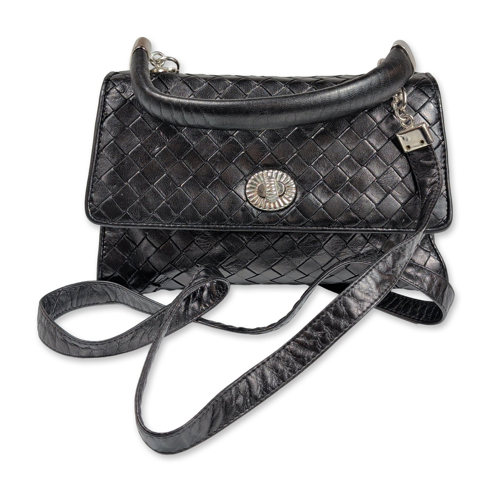 Bottega Veneta Black Intrecciato Leather Handbag: Bottega Veneta. Top handle flap bag in black Nappa leather, featuring the signature hand-woven intrecciato technique throughout the exterior. The bag is designed with a structured tubular top handle a