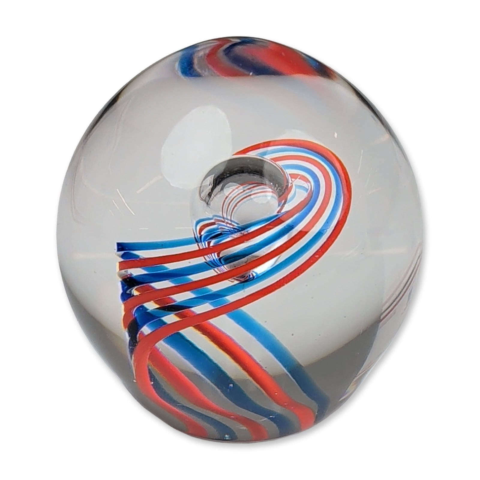 Art Glass Ribbon Twist Paperweight: Baccarat commemorative paperweight in clear and amber glass, featuring a frosted intaglio portrait of President Harry S. Truman. The clear glass dome is cut with multiple geometric facets and rests on