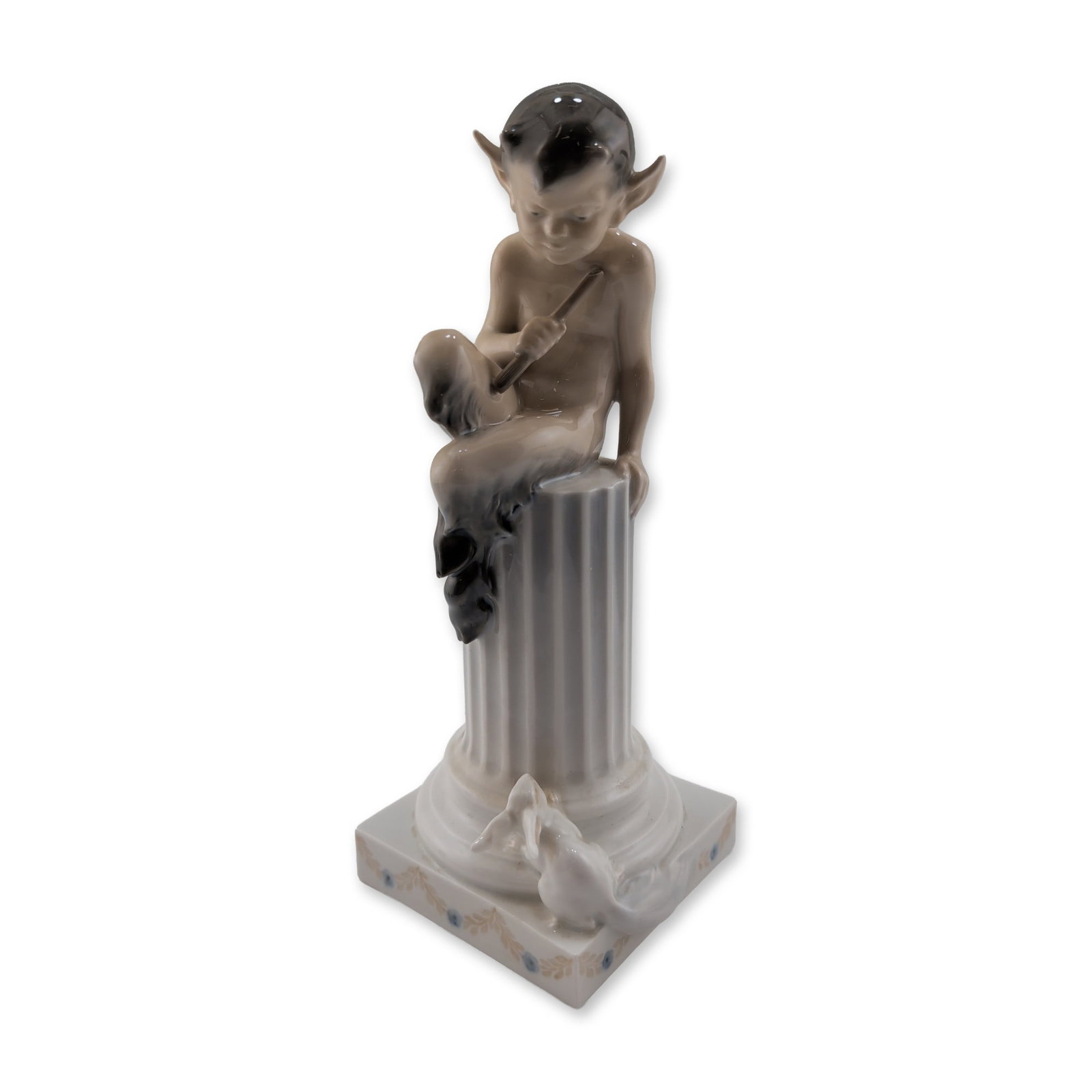 Royal Copenhagen Christian Thomsen Porcelain Faun on Column Figurine: Royal Copenhagen figurine in polychrome glazed porcelain, model number 456, titled Faun on Column and designed by Christian Thomsen. The figure depicts a mythological faun seated atop a fluted
