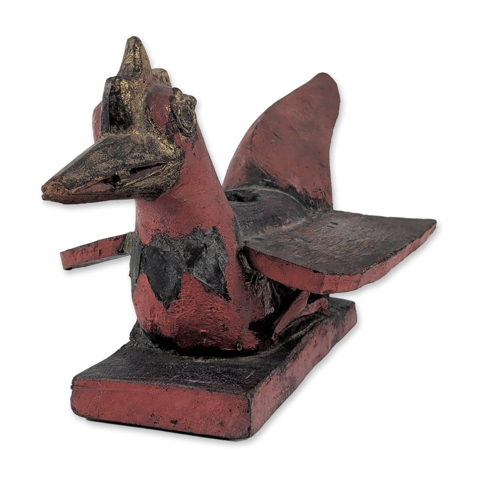 Antique Polychrome Wood Folk Art Bird Architectural Sculpture: Folk art avian sculpture carved from wood with polychrome paint, featuring a stylized bird figure with simplified wings and a crested head. The piece is finished in a palette of red and black paint