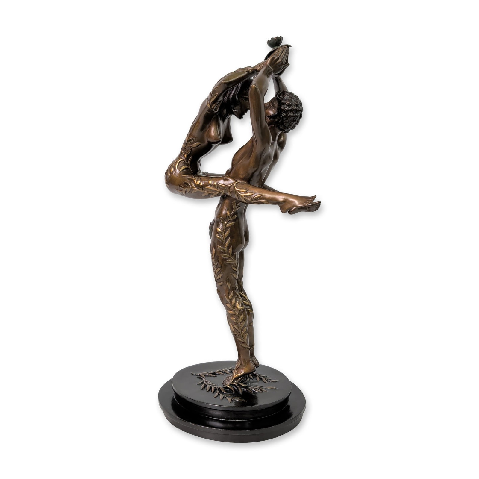 Erte (Russian/French, 1892-1990), Bronze Sculpture, The Lovers, Signed & Numbered: Erte (Russian-French, 1892-1990) cast bronze figurative sculpture titled Amants (The Lovers), depicting a male and female figure in an entwined embrace. The figures transition into stylized laurel lea