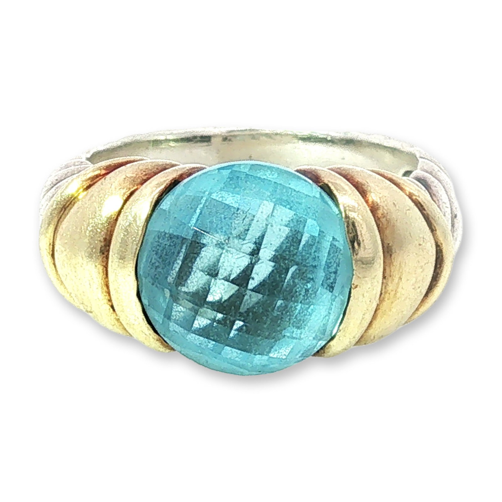 David Yurman Sterling Silver and 14K Blue Topaz Ring: David Yurman cocktail ring in sterling silver and 14k yellow gold, featuring a large round checkerboard-faceted light blue topaz. The gemstone is positioned between two raised, ribbed 14k yellow gold 