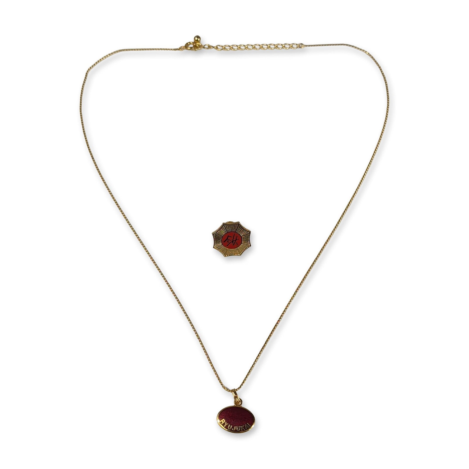 2pc Ryujukai Gold-Tone Necklace and Lapel Pin: Artisanal and ethnic-style necklace collection featuring organic and recycled materials. Group includes a wide bib-style collar necklace with an openwork lattice design composed of elongated light-bro