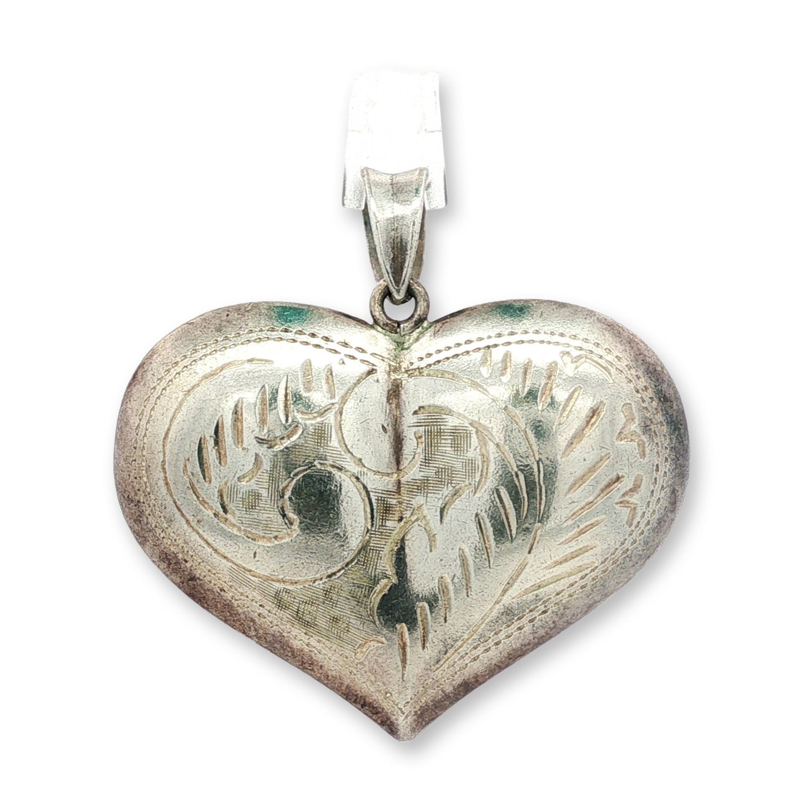 Sterling Silver Etched Puffy Heart Pendant: An assortment of Italian religious pendants comprising three crucifixes and one filigree cross. The group features a large silver-tone crucifix with black enamel and composite inlay and a corpus, with