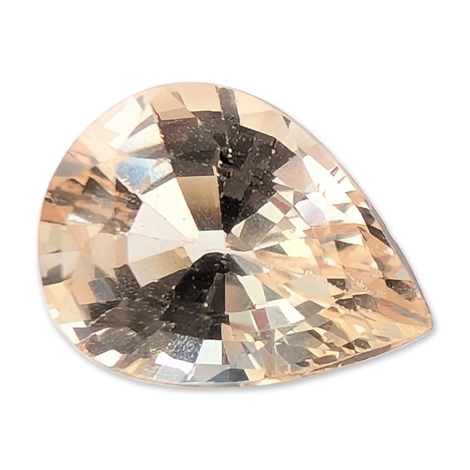 1.30ct Imperial Pear Cut Sapphire: Collection of five unmounted gemstones that appear to be natural sapphires, featuring a peacock blue color palette. The unmounted stones showcase a range of gradient tones from light aquatic blue to d
