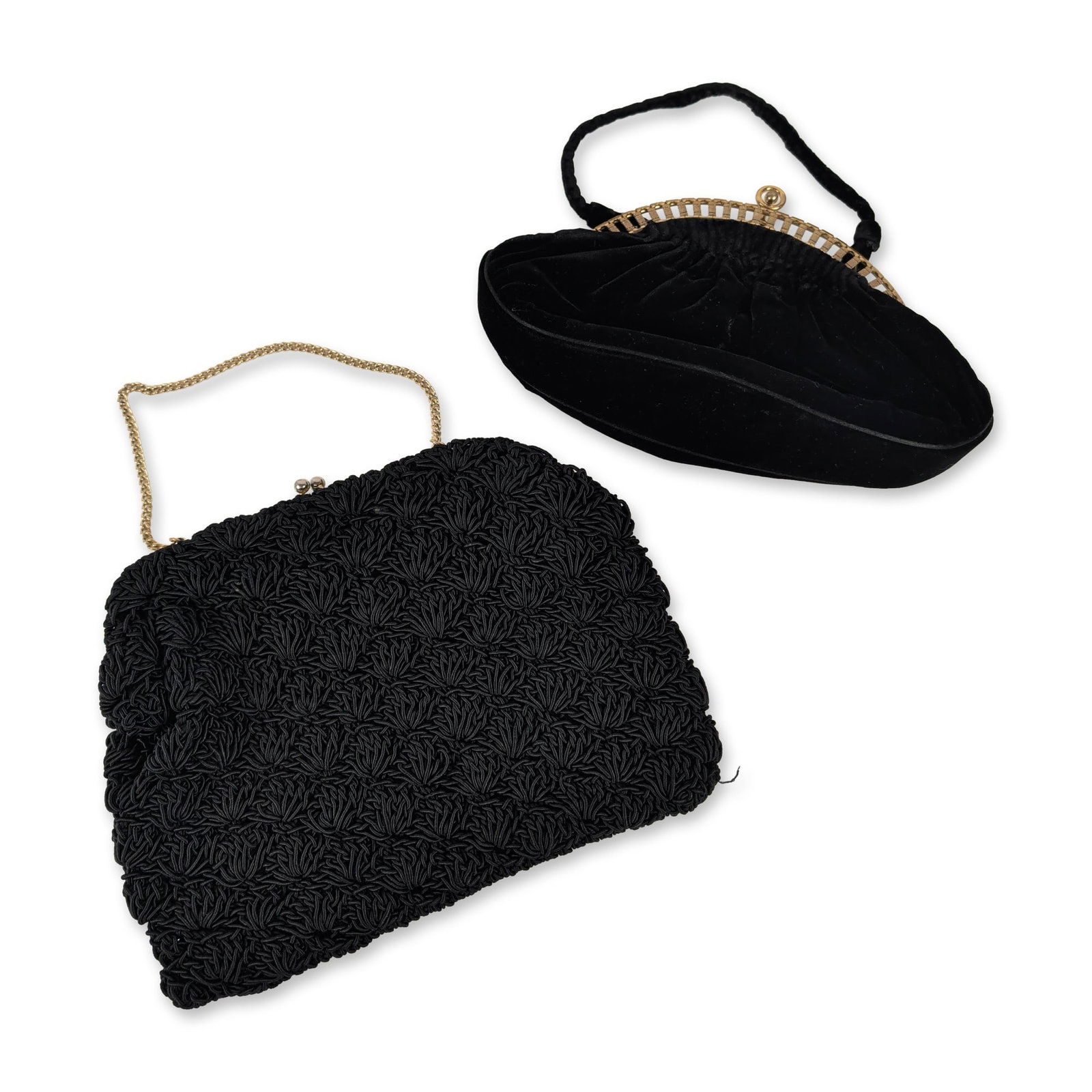 Two Vintage Black Evening Bags including Milgrim: Mid-20th century. Milgrim evening pouch in black velvet featuring a semi-circular gold-tone metal frame with an ornate openwork cage design and a kiss-lock closure. The bag includes a black fabric loo