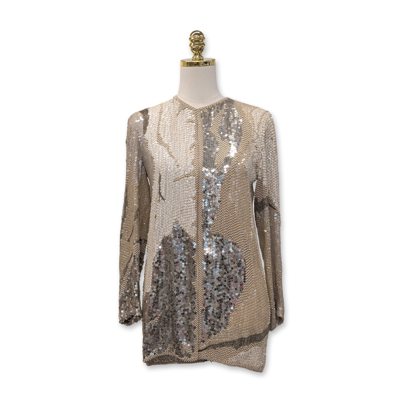 Halston Vintage Beaded Silk Sequin Cardigan: Halston, late 1970s to early 1980s. Long-sleeve silk tunic top featuring allover hand-applied bead and sequin embellishments in a wavy abstract motif. The design utilizes a palette of cream, silver, a