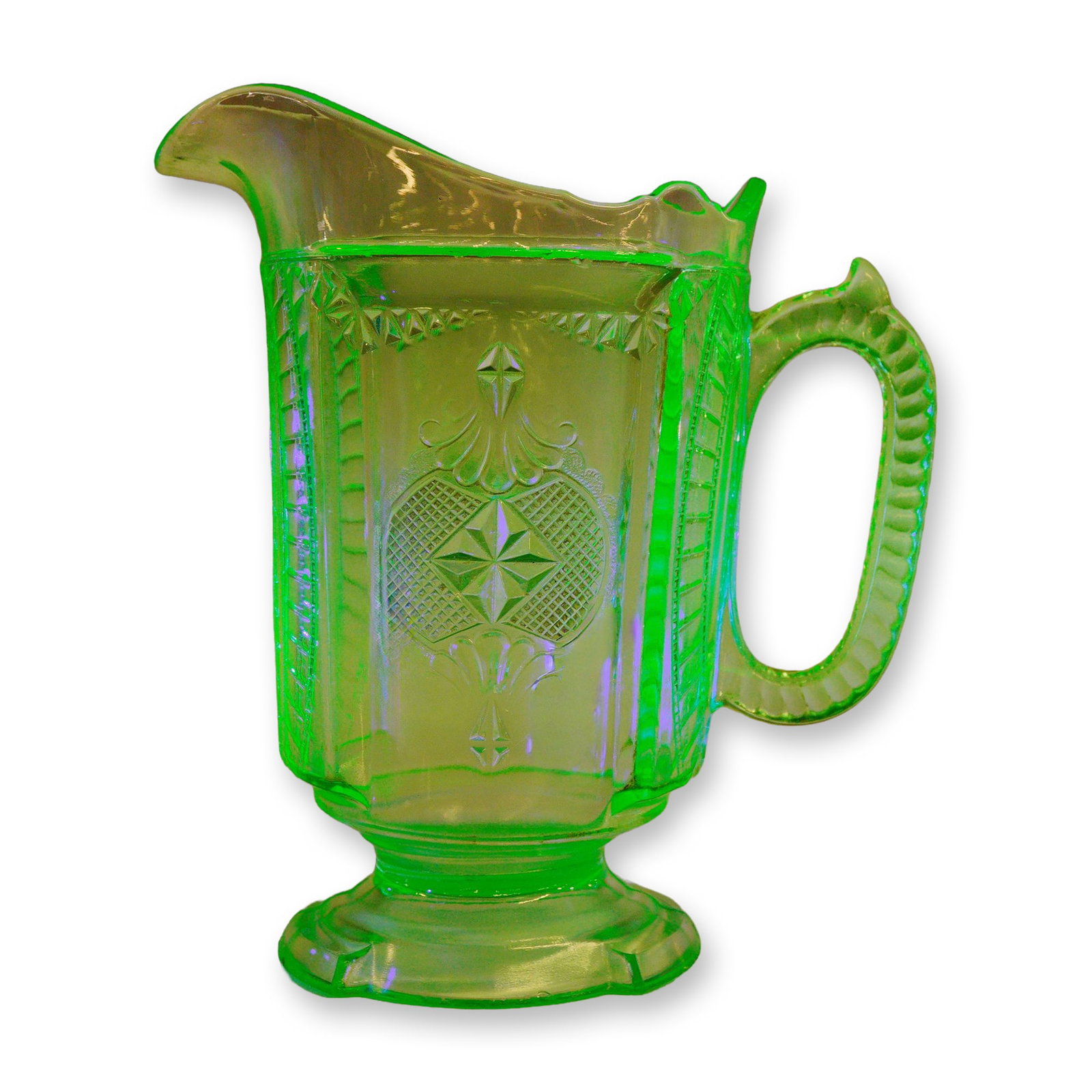 Richards & Hartley EAPG Uranium Pitcher c.1880: Attributed to Richards and Hartley, circa 1880, this Early American pressed glass uranium pitcher is a single, footed example of EAPG production. The vessel is crafted from transparent green uranium g
