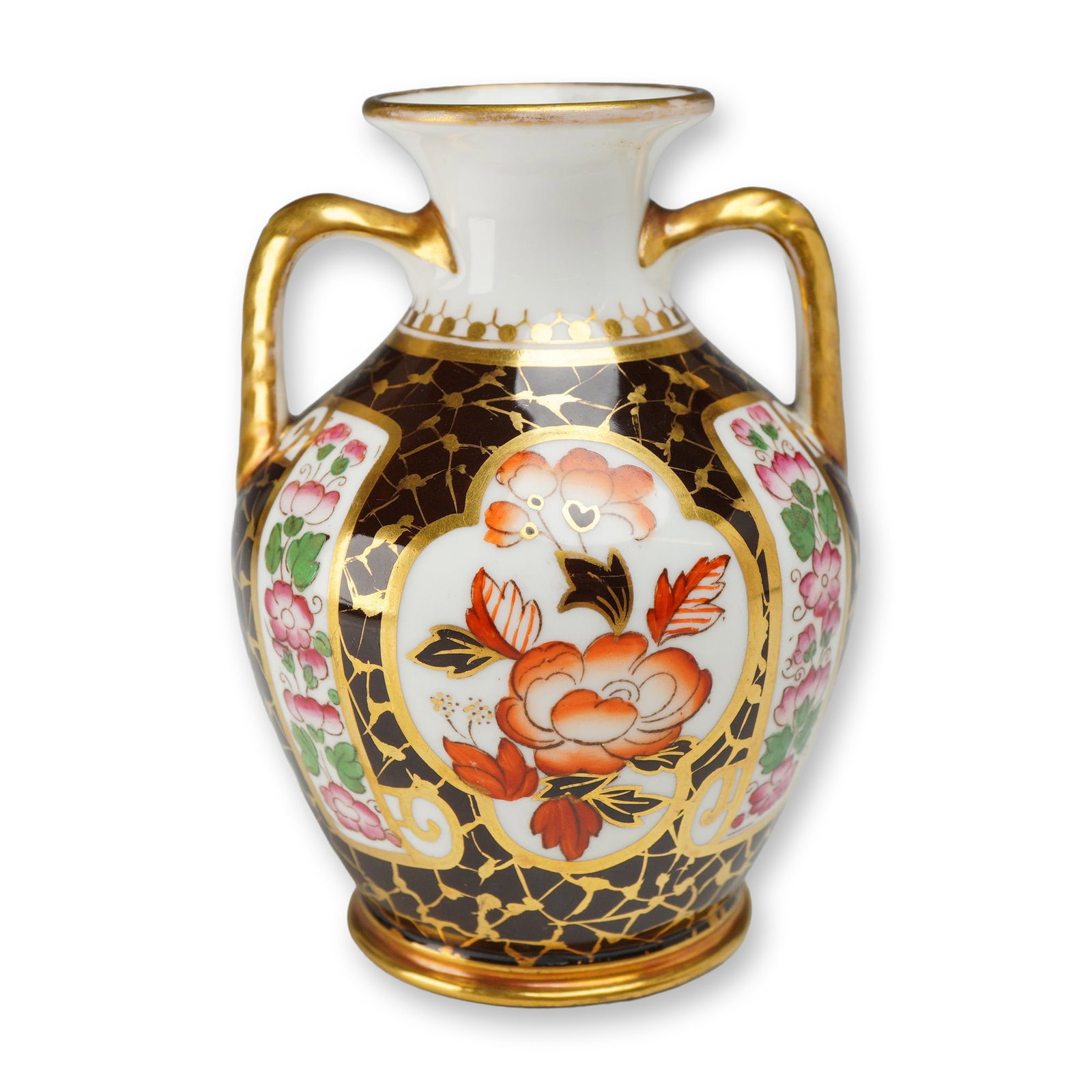 Wedgwood Bone China Imari Style Twin Handled Miniature Vase ca 1870: A Wedgwood fine bone china miniature twin-handled vase decorated in the Imari style. The vessel features a dark chocolate brown ground with an overall gilded vermicelli or crackle overlay. It is embel