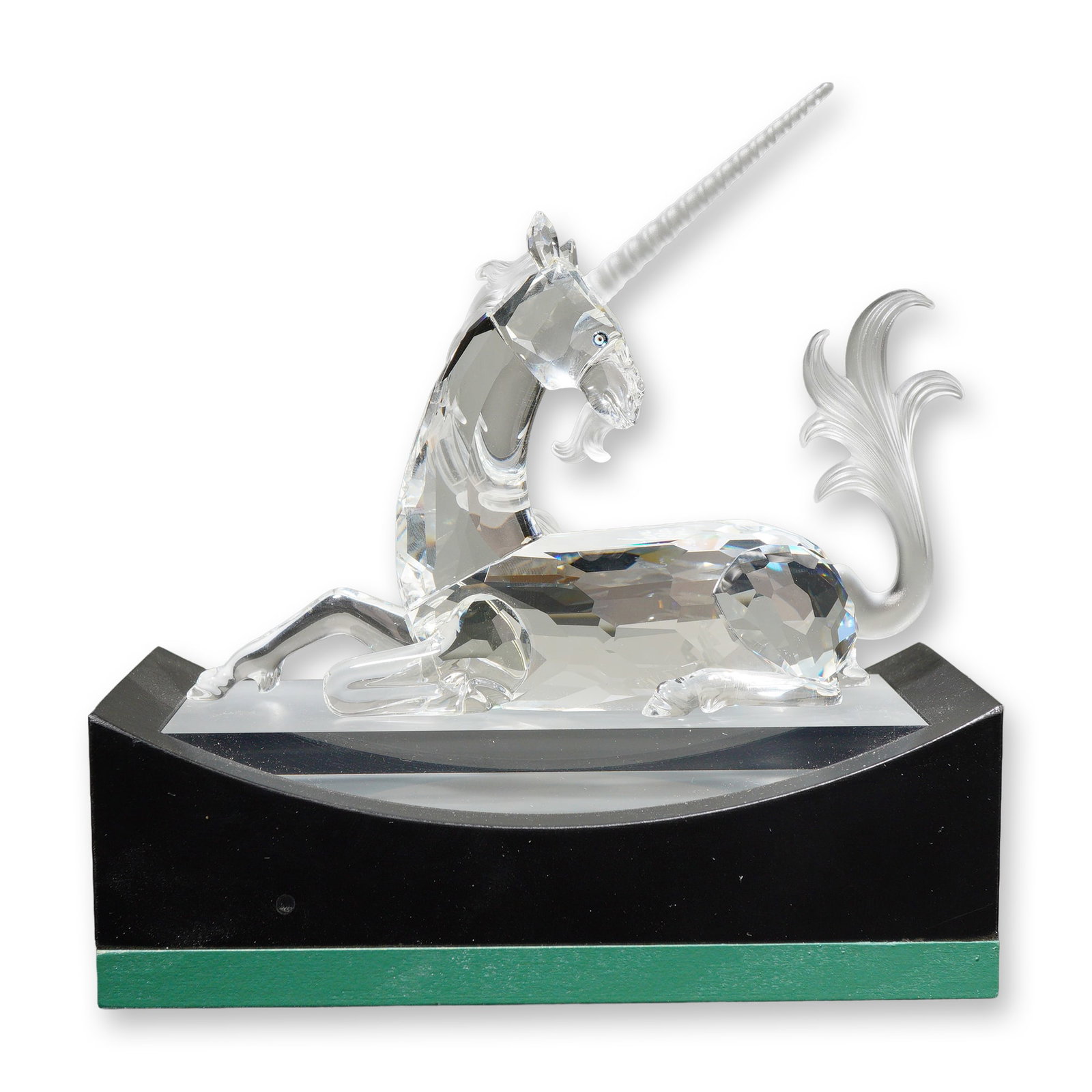 2pc Swarovski Crystal 1996 SCS Annual Edition Figurine, The Unicorn with Base: Swarovski 1996 Annual Edition figurine titled The Unicorn, representing the first piece in the Fabulous Creatures trilogy. The figure is constructed of faceted clear lead crystal with a frosted