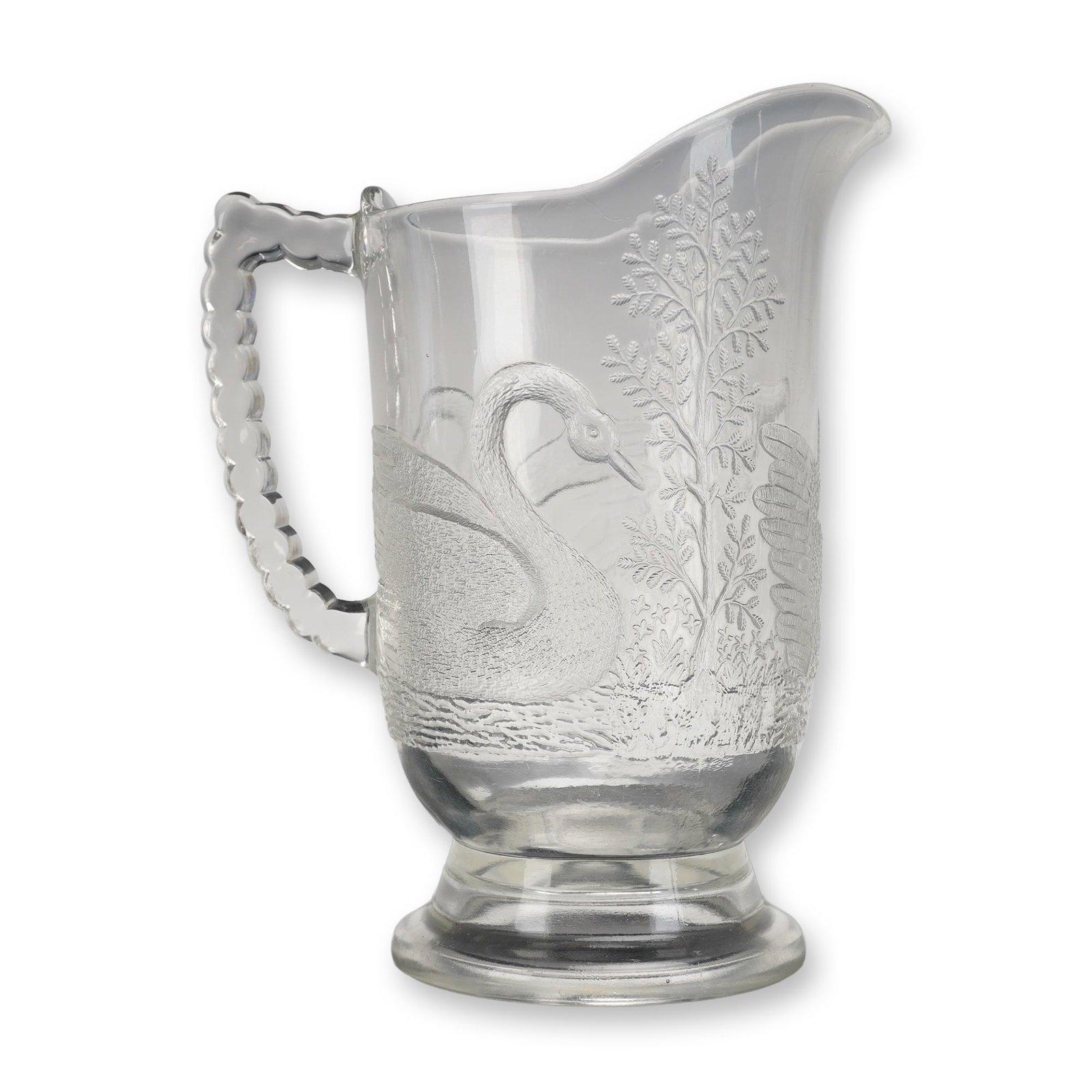 United States Glass Co. No. 6405 Panelled Swan EAPG Water Pitcher: A clear molded glass Early American Pattern Glass (EAPG) Water Pitcher, attributed to the United States Glass Co. pattern No. 6405 (also known as Panelled Swan or Aquarium), circa 1898. The pitcher