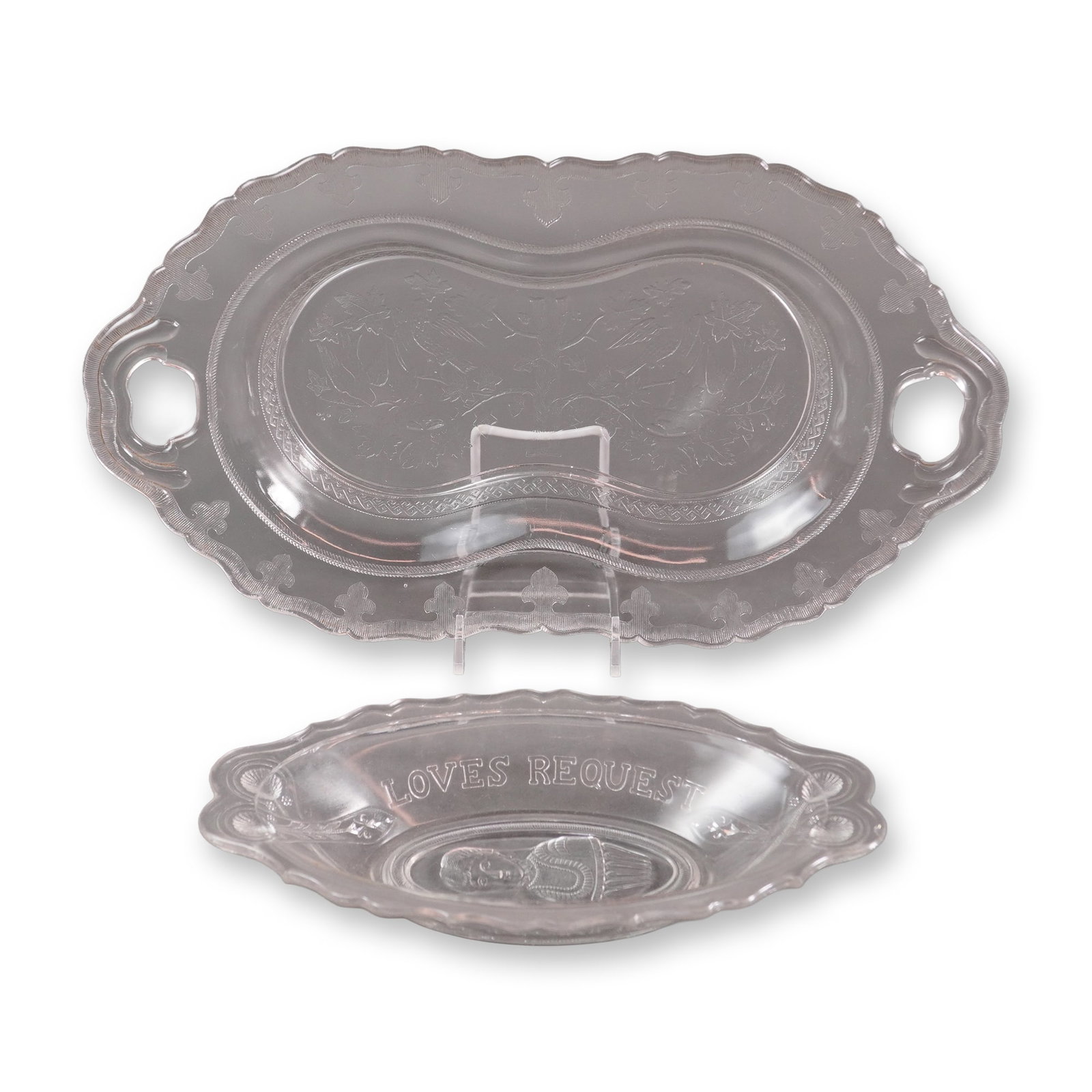 A Pair of EAPG Pressed Glass Serving Dishes, Late 19th Century: A pair of Early American Pattern Glass (EAPG) serving dishes, circa late 19th century. This 2pc EAPG Serving Dishes lot includes a large double-relish or celery dish and a smaller oval relish dish.