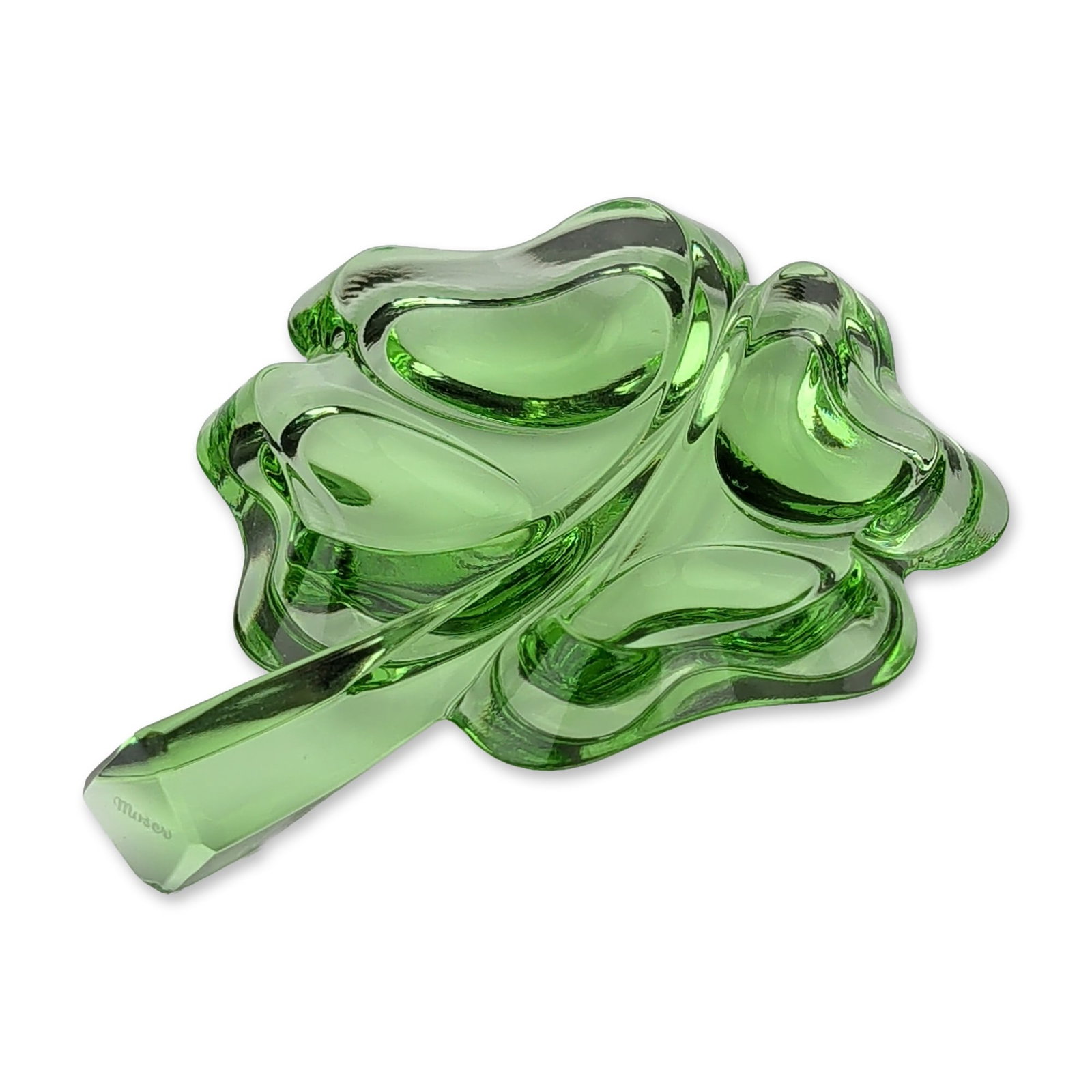 Moser Green Crystal Four-Leaf Clover Paperweight: A decorative four-leaf clover paperweight in beryl green crystal, featuring organically shaped lobes with internal undulating contours and a faceted stem. Signed with acid-etched Moser mark to the