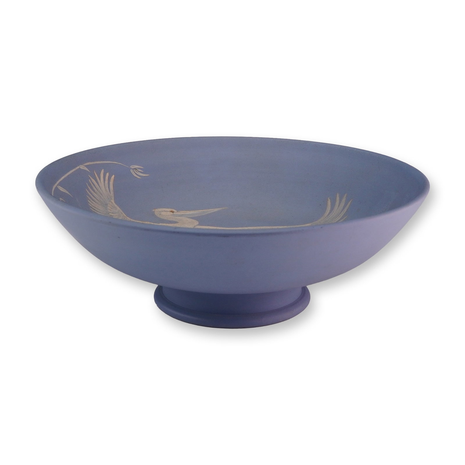 Wedgwood Jasperware Pale Blue Footed Centerpiece Bowl with Pelican Design: A Wedgwood pale blue jasperware footed centerpiece bowl featuring white bas-relief decoration. The interior of the shallow bowl depicts a pelican in flight above aquatic botanical sprigs. The piece is