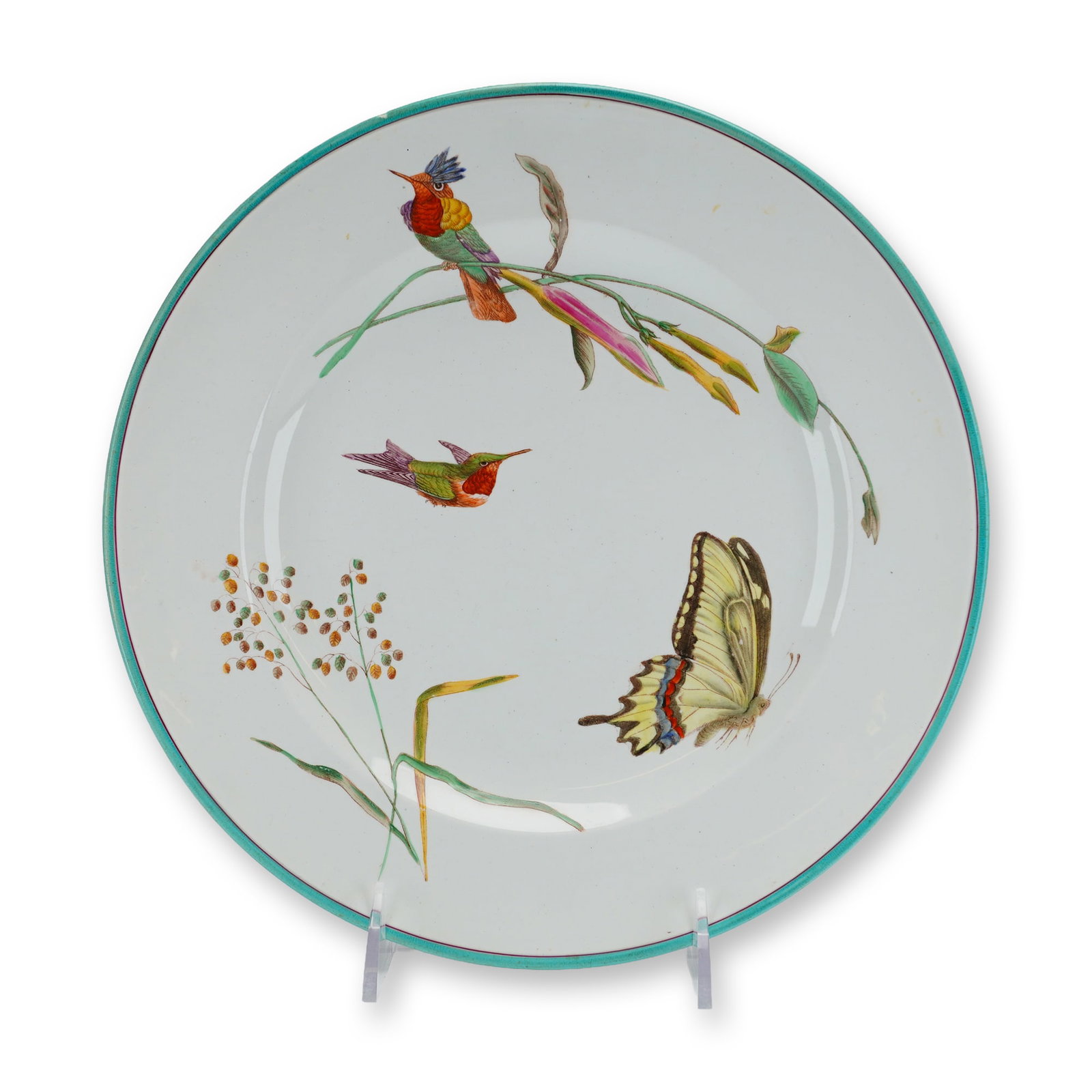 Wedgwood Creamware Hummingbird and Flowers Pattern Plate: This late 19th-century Wedgwood creamware plate is decorated in the Hummingbird and Flowers pattern. The circular plate is crafted from fine white earthenware, or Queen's Ware, and features hand-paint
