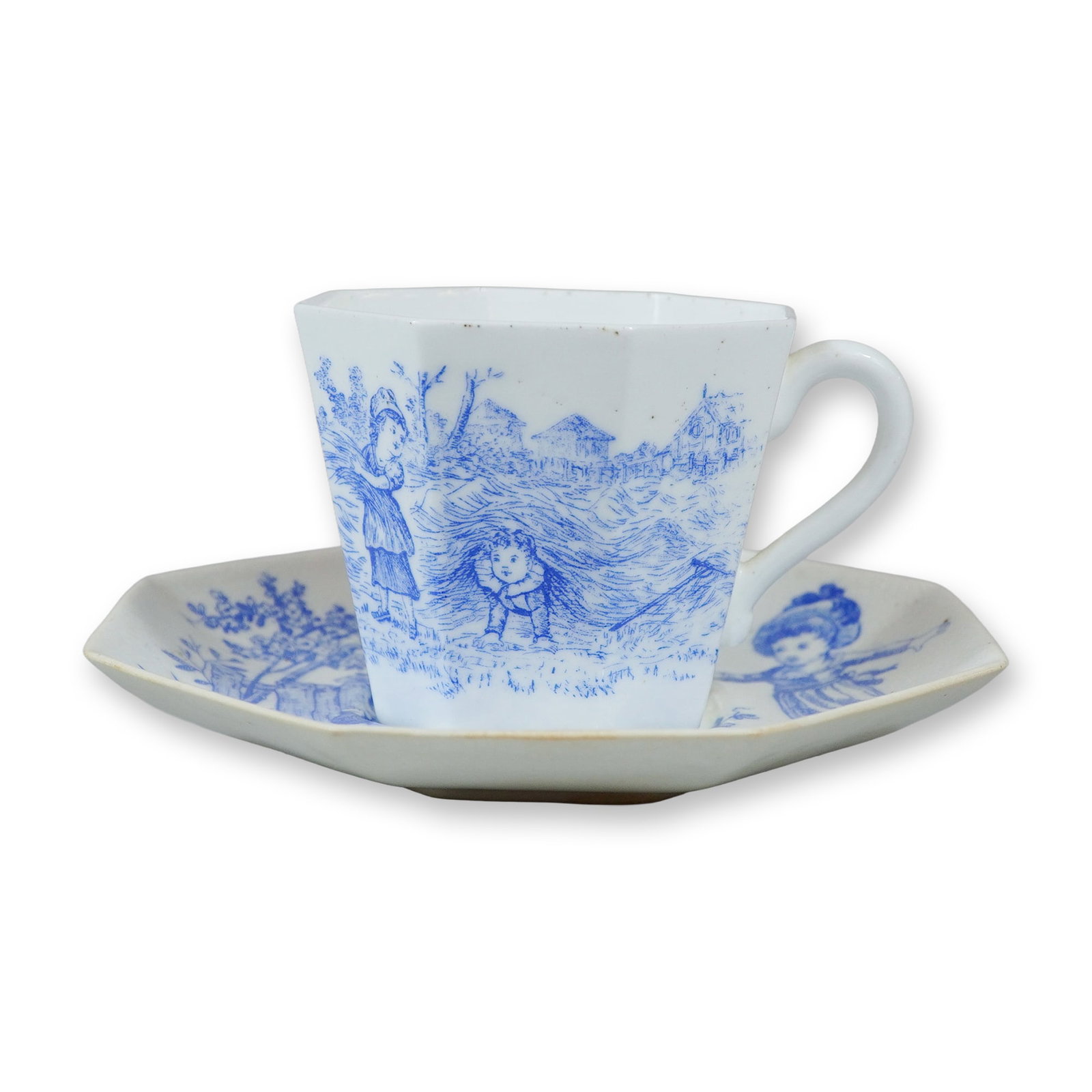 2pc Wedgwood Octagonal Blue and White Transfer-Printed Porcelain Cup and Saucer: An octagonal porcelain cup and saucer featuring blue transfer-printed scenes of children at play. The saucer depicts a boy and girl playing a game of battledore and shuttlecock near a fence beneath a 
