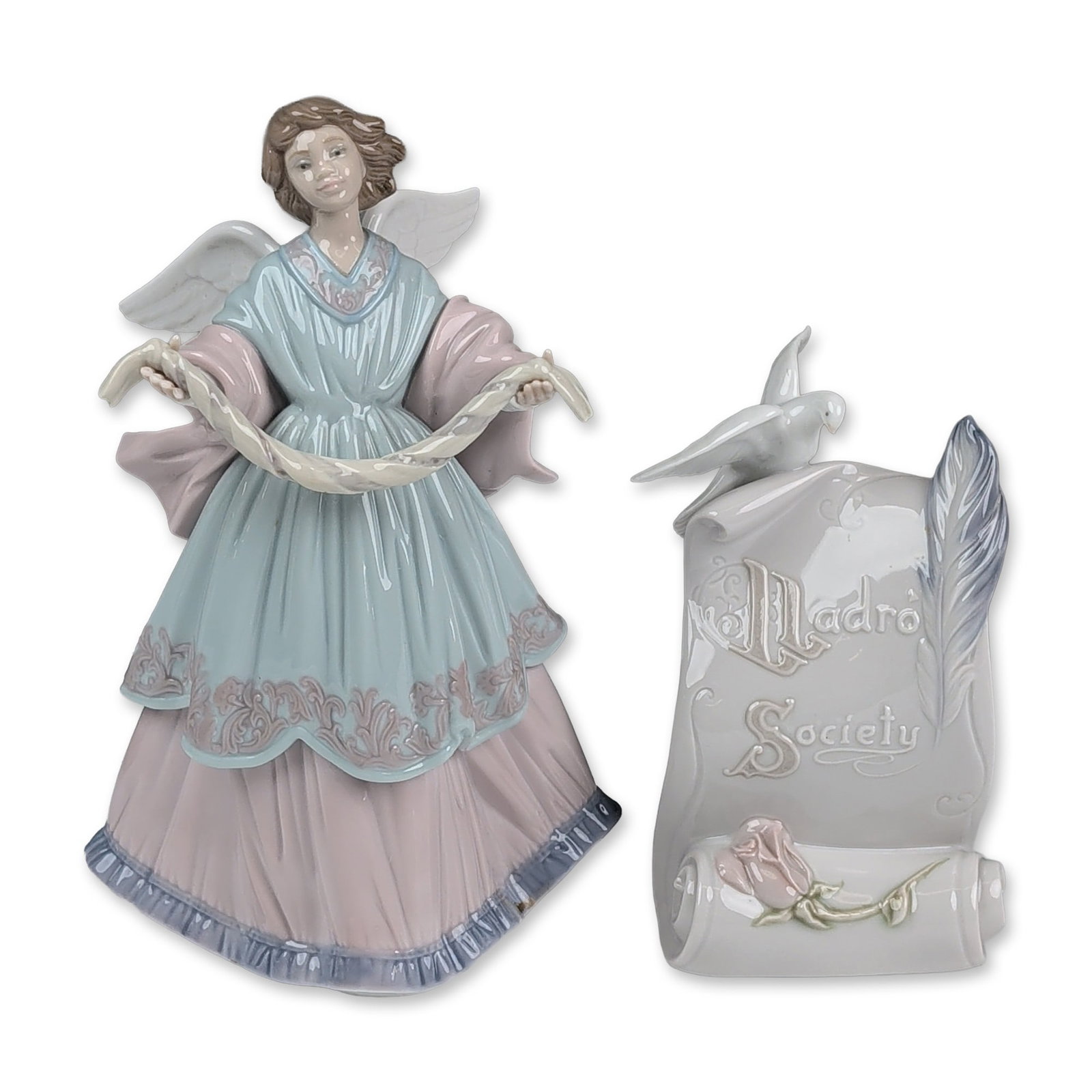 2pc Lladro Porcelain Figurines, Joyful Offering 01006125 and Society Plaque: Lladro porcelain Joyful Offering angel figurine and a 1985 Lladro Collectors Society Charter Member scroll plaque. The winged angel is depicted in a pleated gown of pale blue and pink with relief scro