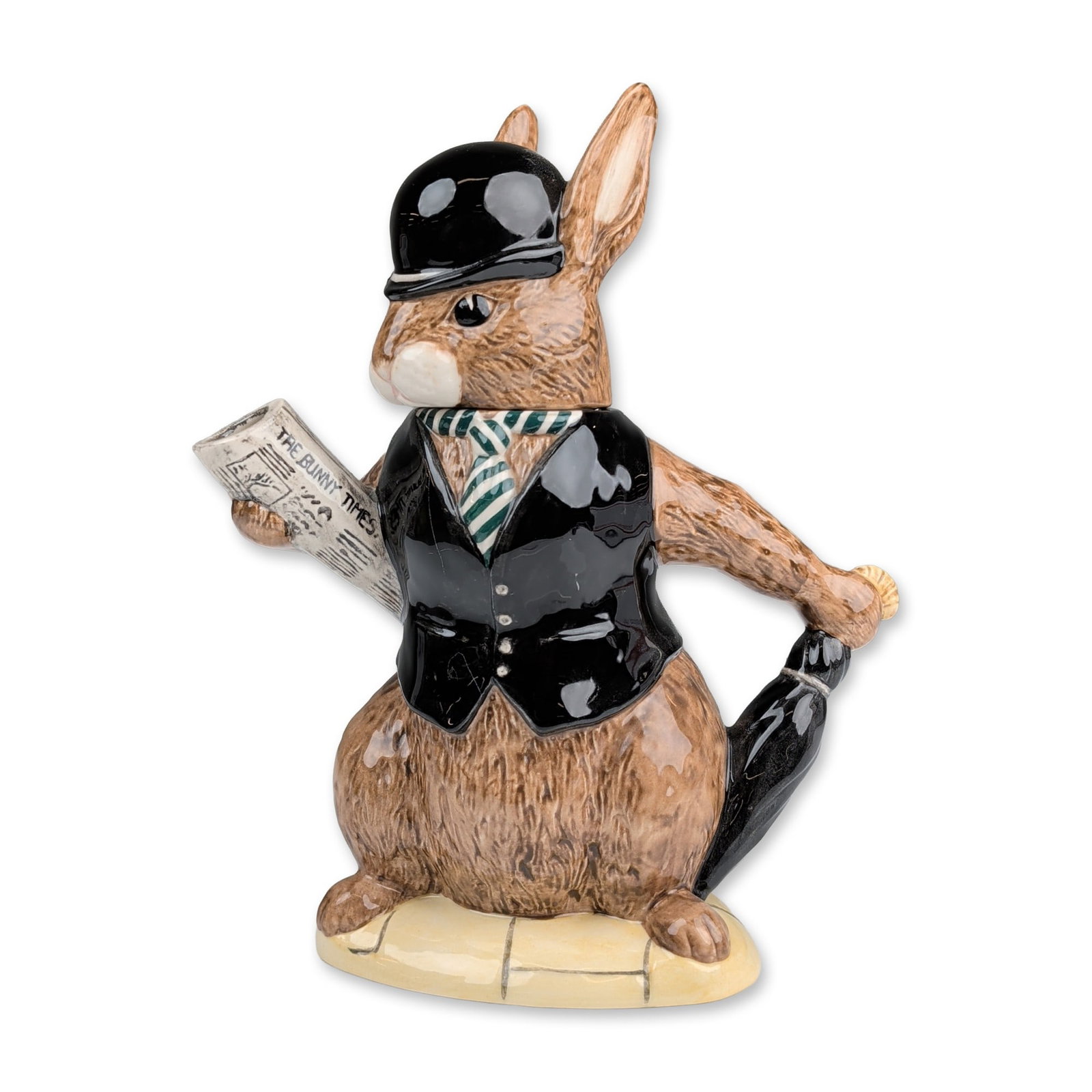 Royal Doulton Bunnykins City Gent London Figural Teapot: Royal Doulton glazed ceramic figural teapot from the Bunnykins Teapots of the World series. Model D 6966, titled City Gent, depicting an anthropomorphic rabbit in London business attire. The rabbit we