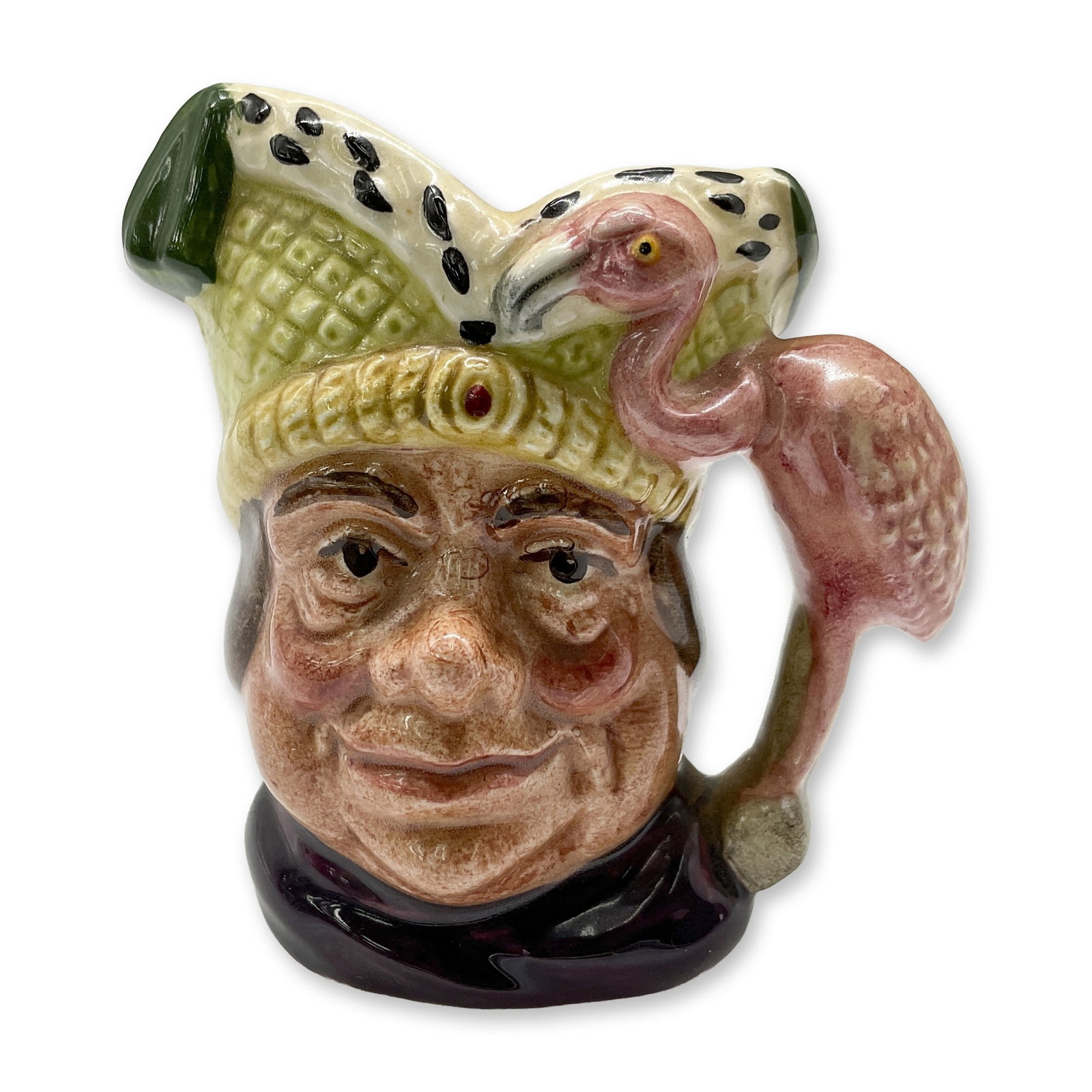 Ugly Duchess D6607 - Mini - Royal Doulton Character Jug: Green, purple, and pink coloration. Royal Doulton backstamp. Artist: Max Henk Dimensions: 2.5"H Date or Era: 1965 - 1973 Manufacturer or Brand: Royal Doulton Country of Origin: England