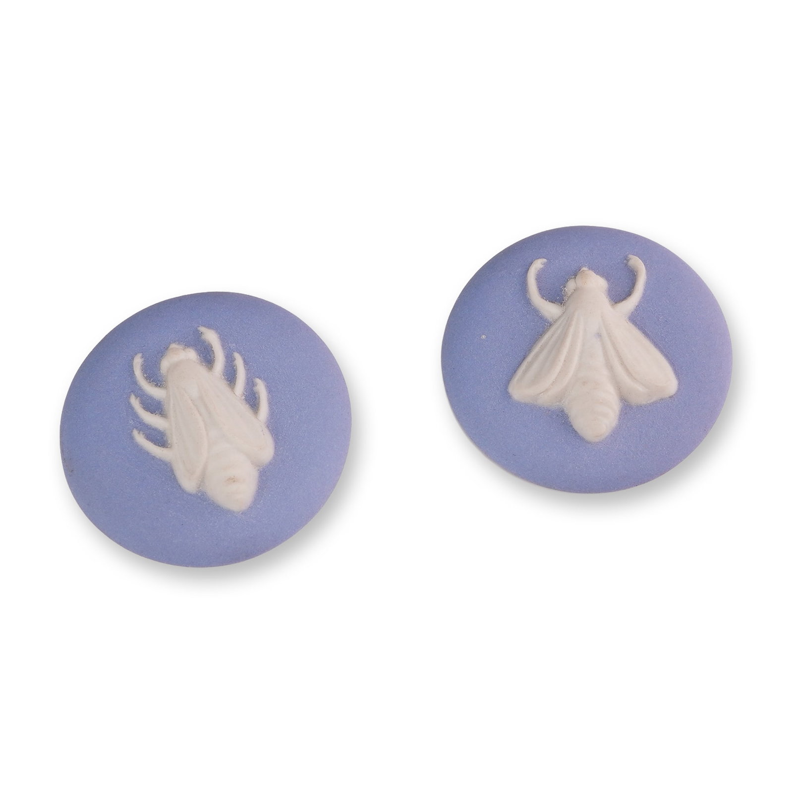 Pair of Jasperware Style Ceramic Insect Cameos: Pair of unmounted jasperware-style stoneware cameo cabochons featuring white bas-relief insect designs on a lavender-blue ground. One cabochon depicts a beetle or cicada-like insect, and the other dep