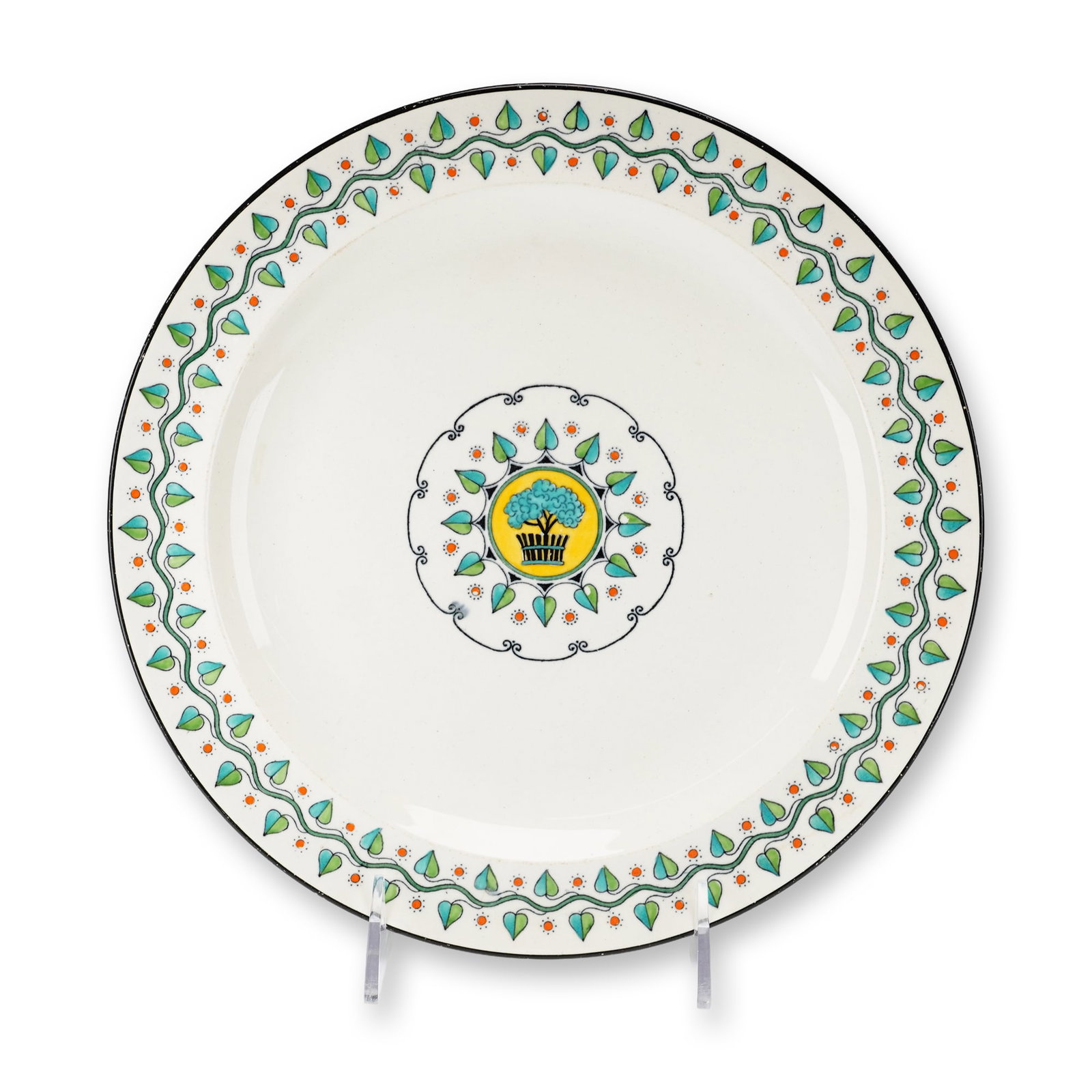 Wedgwood Dartmouth Pattern Earthenware Plate AL 6865: A glazed earthenware plate manufactured by Wedgwood in the Dartmouth pattern. The decoration features a central circular medallion with a stylized blue tree set against a yellow ground, enclosed by a 