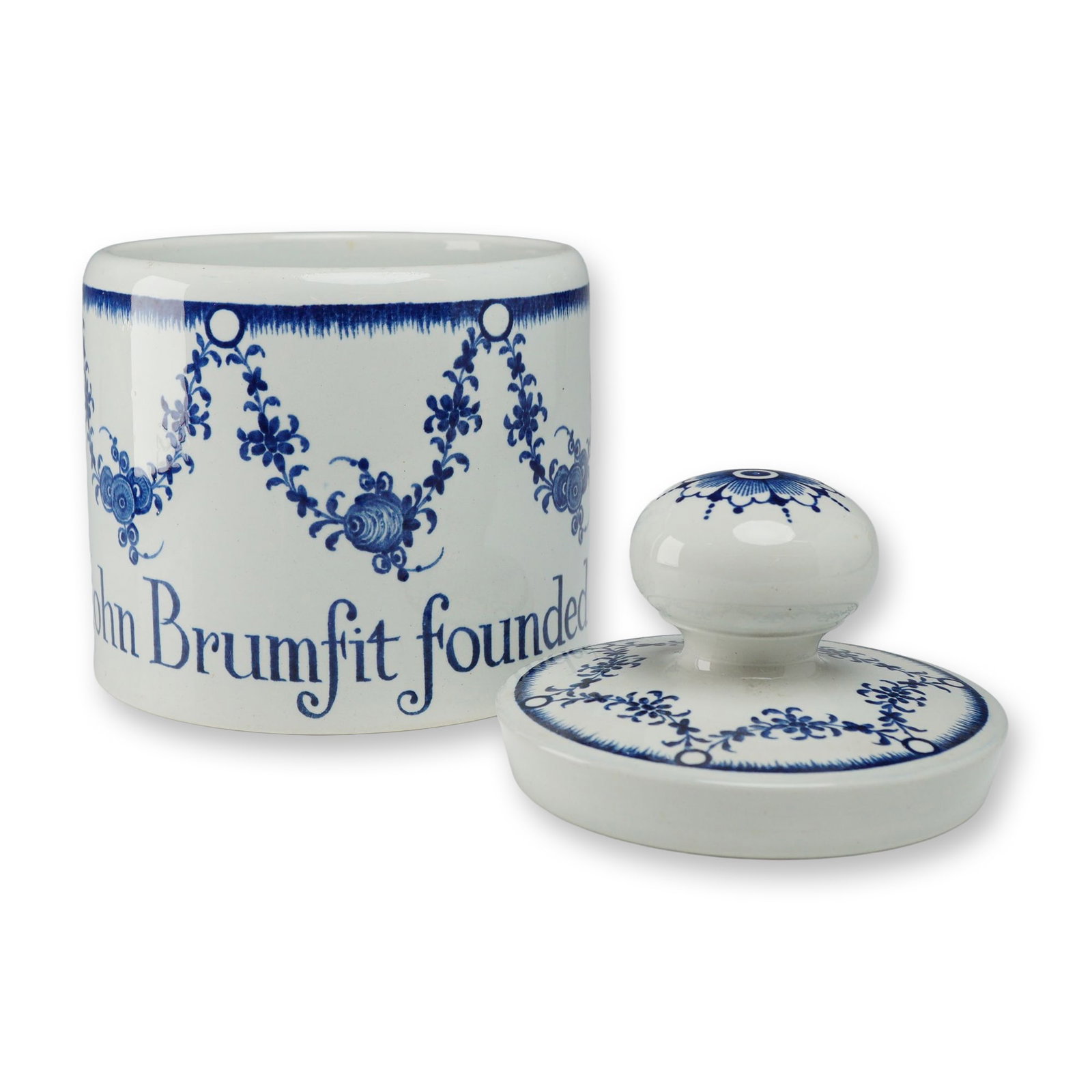 Wedgwood John Brumfit Limited Edition Tobacco Jar: A Wedgwood limited edition tobacco jar or humidor commissioned for the London tobacconist John Brumfit, dating to approximately 1935. The cylindrical jar is manufactured from fine earthenware and feat