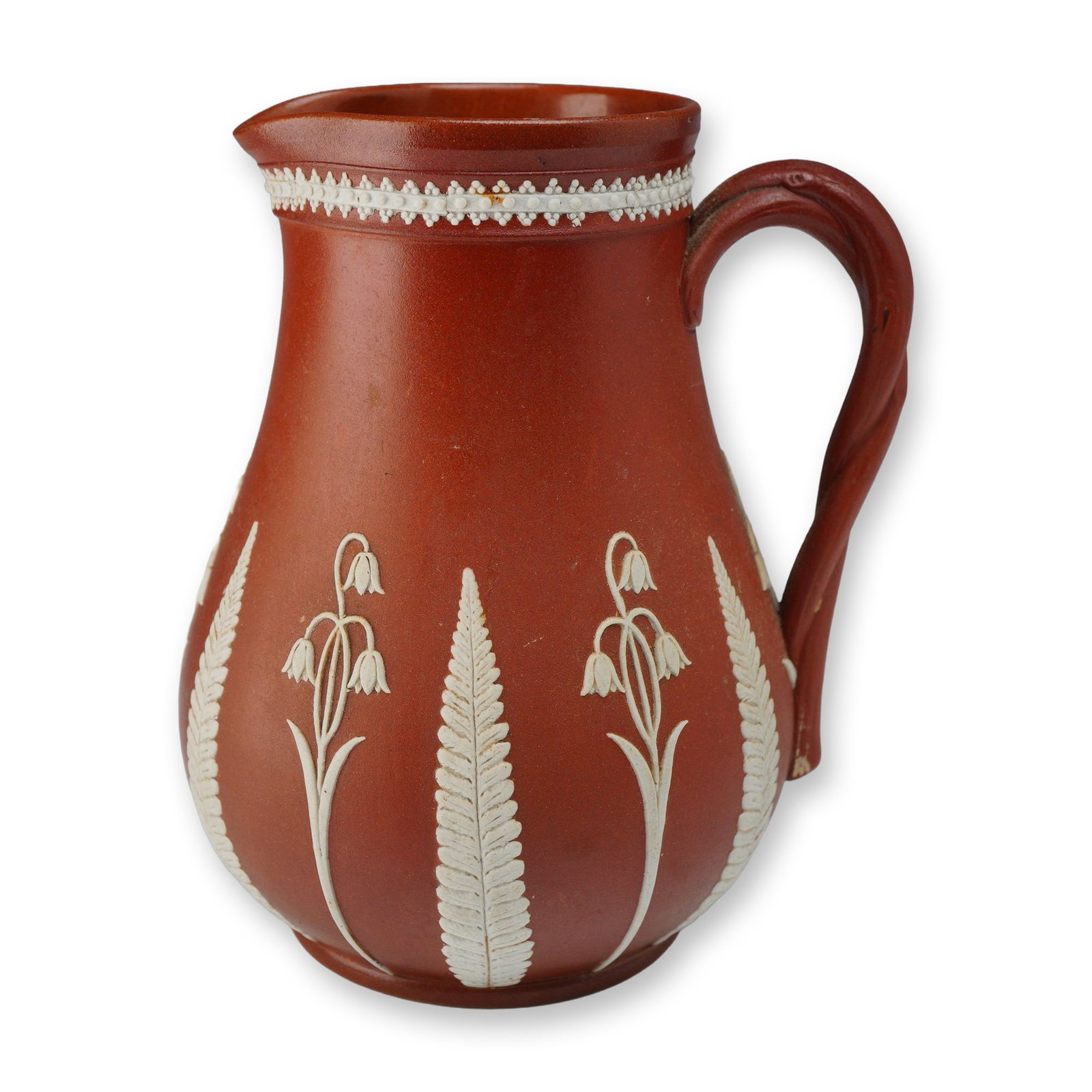 Mid-19th Century Dudson Red Stoneware Jug in a Wedgwood Pattern: This mid-19th century English red stoneware jug by the Dudson factory of Hanley, Staffordshire, is decorated in a style characteristic of a Wedgwood pattern. The vessel is constructed from fine-graine