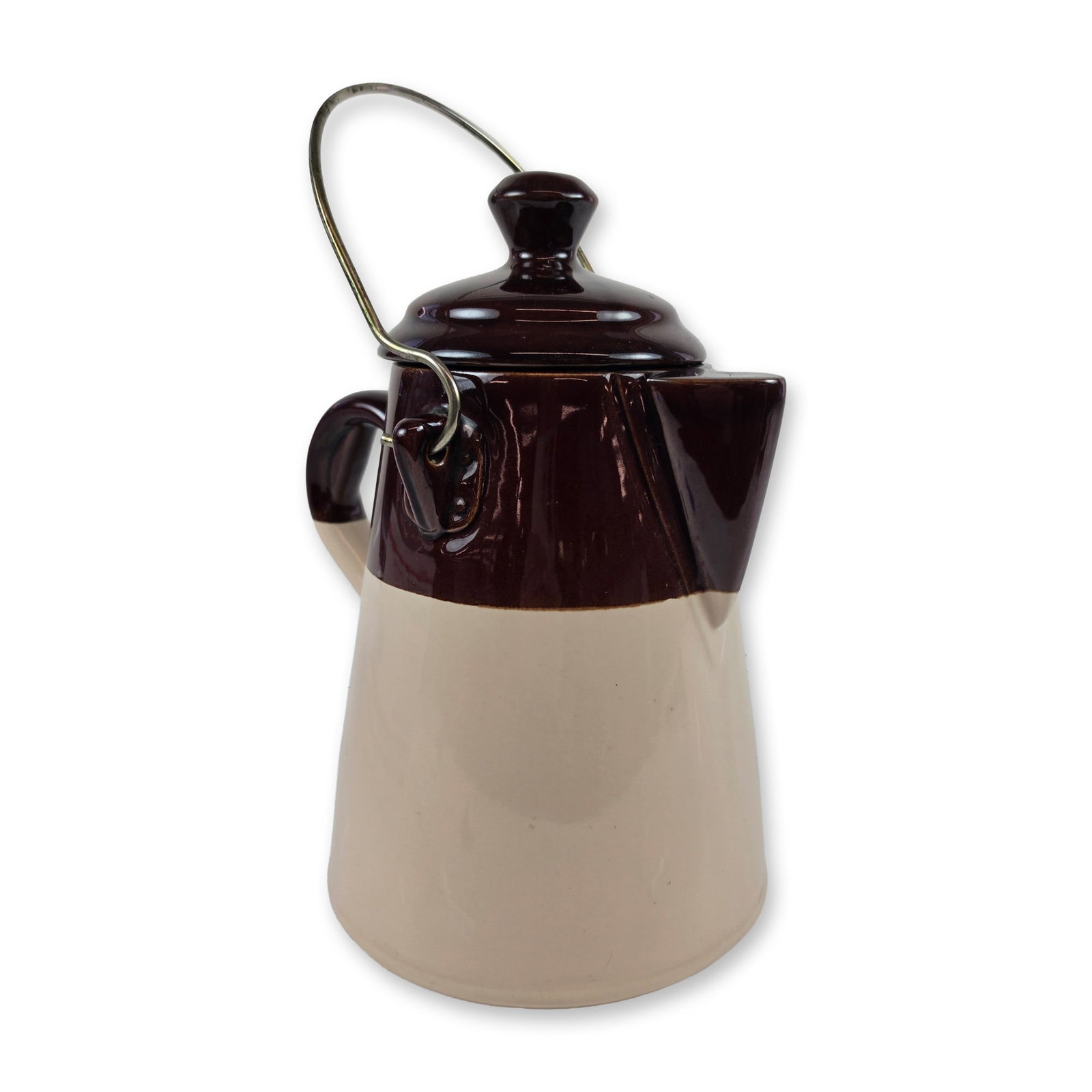 McCoy Ceramic Two-Tone Chuck Wagon Coffee Pot Jug: McCoy Pottery (USA) shape number 186, featuring a dark chocolate brown glazed upper portion and a contrasting cream-colored glazed lower body. The vessel is accompanied by a matching dark brown lid