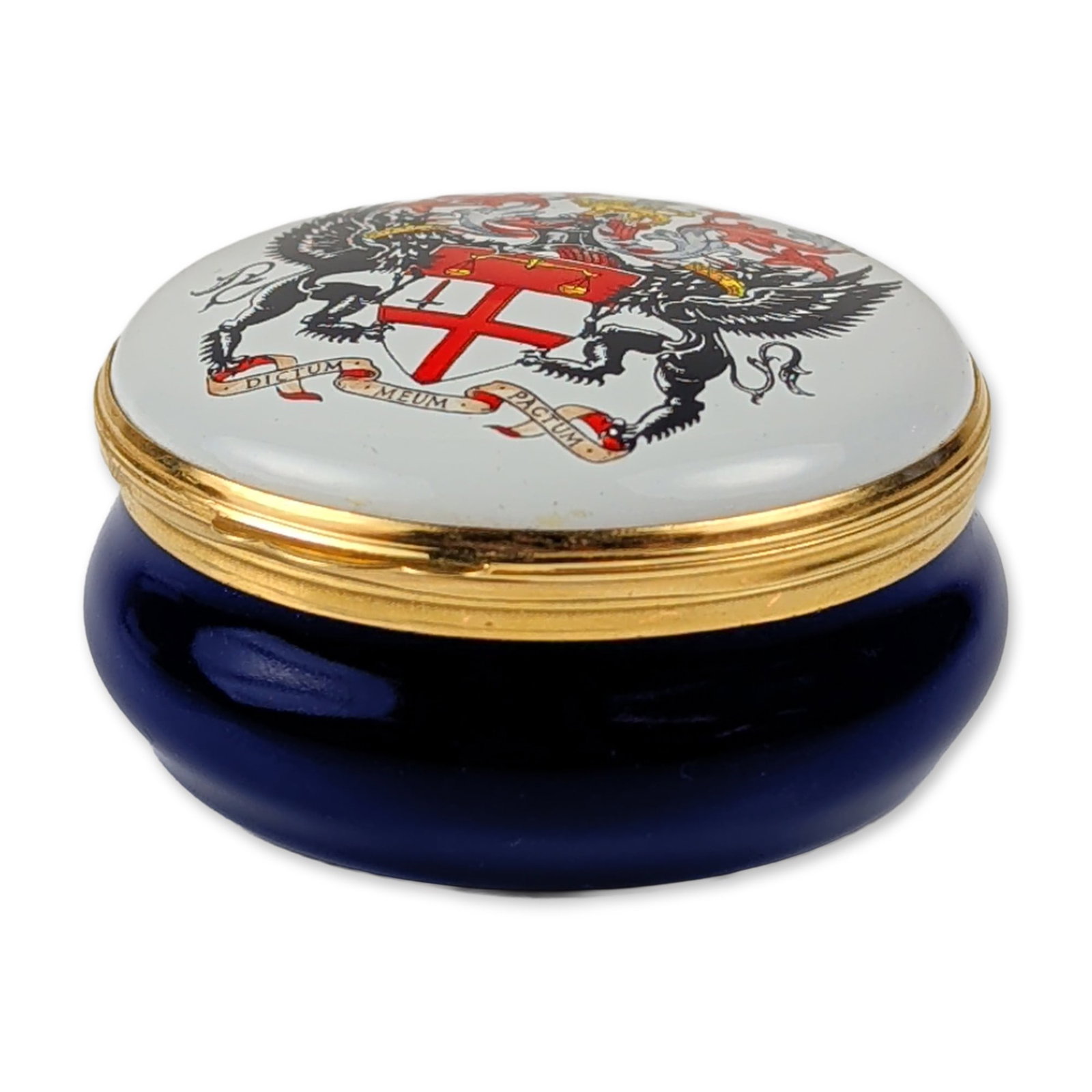 Crummles English Enamel London Stock Exchange Ring Box: Crummles & Co. English hand-painted enamel box of round form. The piece features a deep cobalt blue base and a white domed lid decorated with the armorial crest of the London Stock Exchange. The