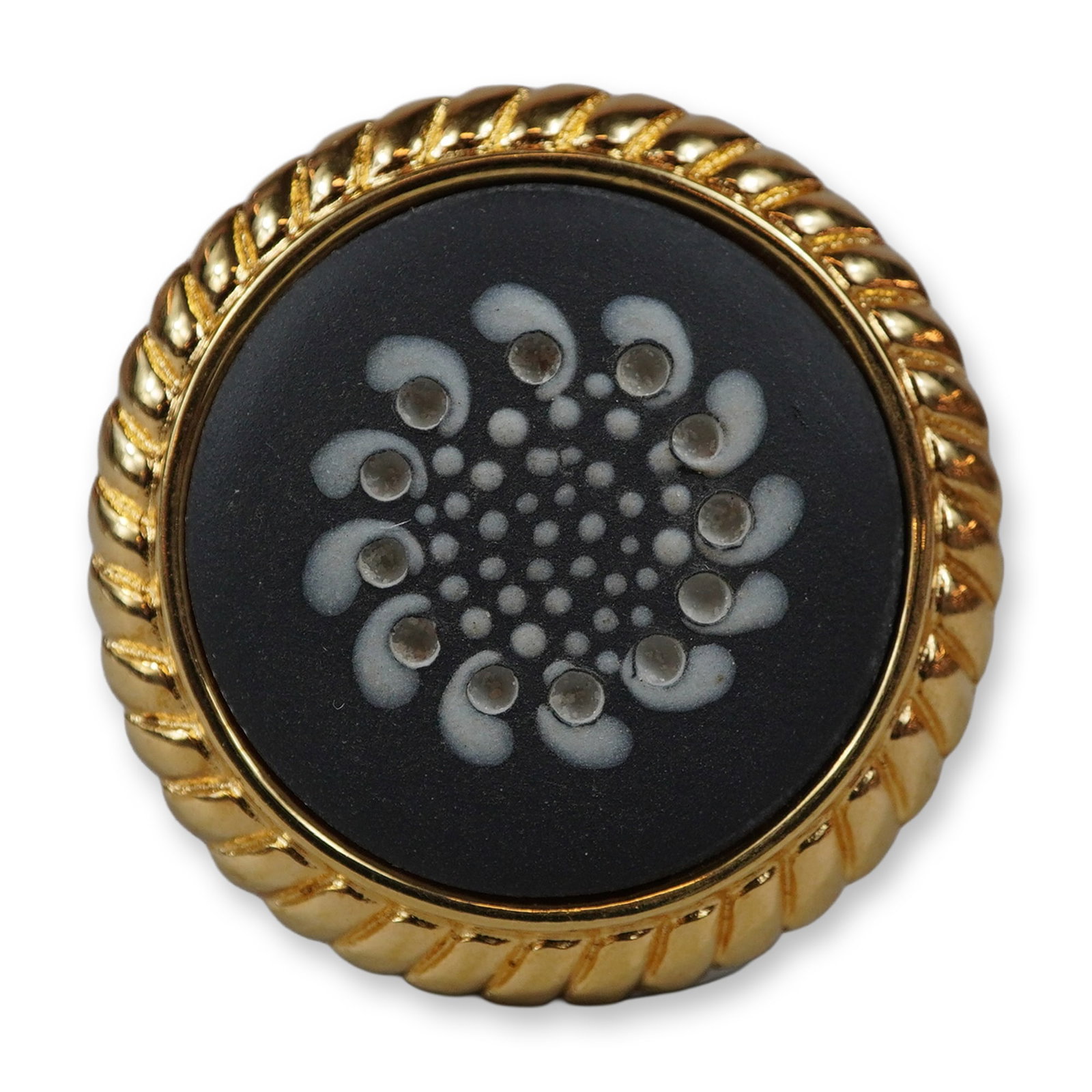 Gold Plated Wedgwood Black Jasperware Ceramic Medallion Brooch: This circular brooch features a center black jasperware porcelain medallion manufactured by Wedgwood. The medallion is decorated with an applied white bas-relief stylized radial motif consisting of a