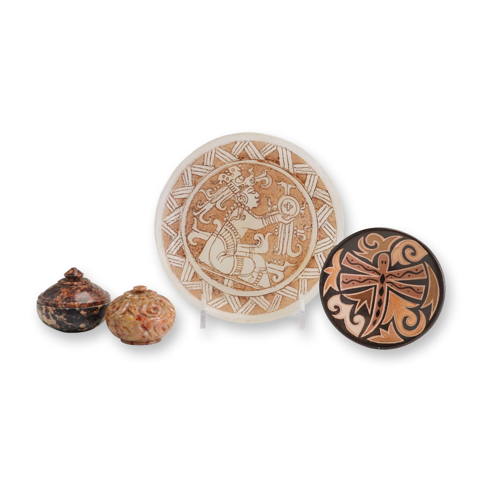 4pc Mayan-Style and Australian Decorative Items: Collection of four ethnic decorative objects, including one Mayan-style plate, one Australian low bowl, and two lidded stone trinket boxes. The circular Mayan-style plate is crafted from translucent w