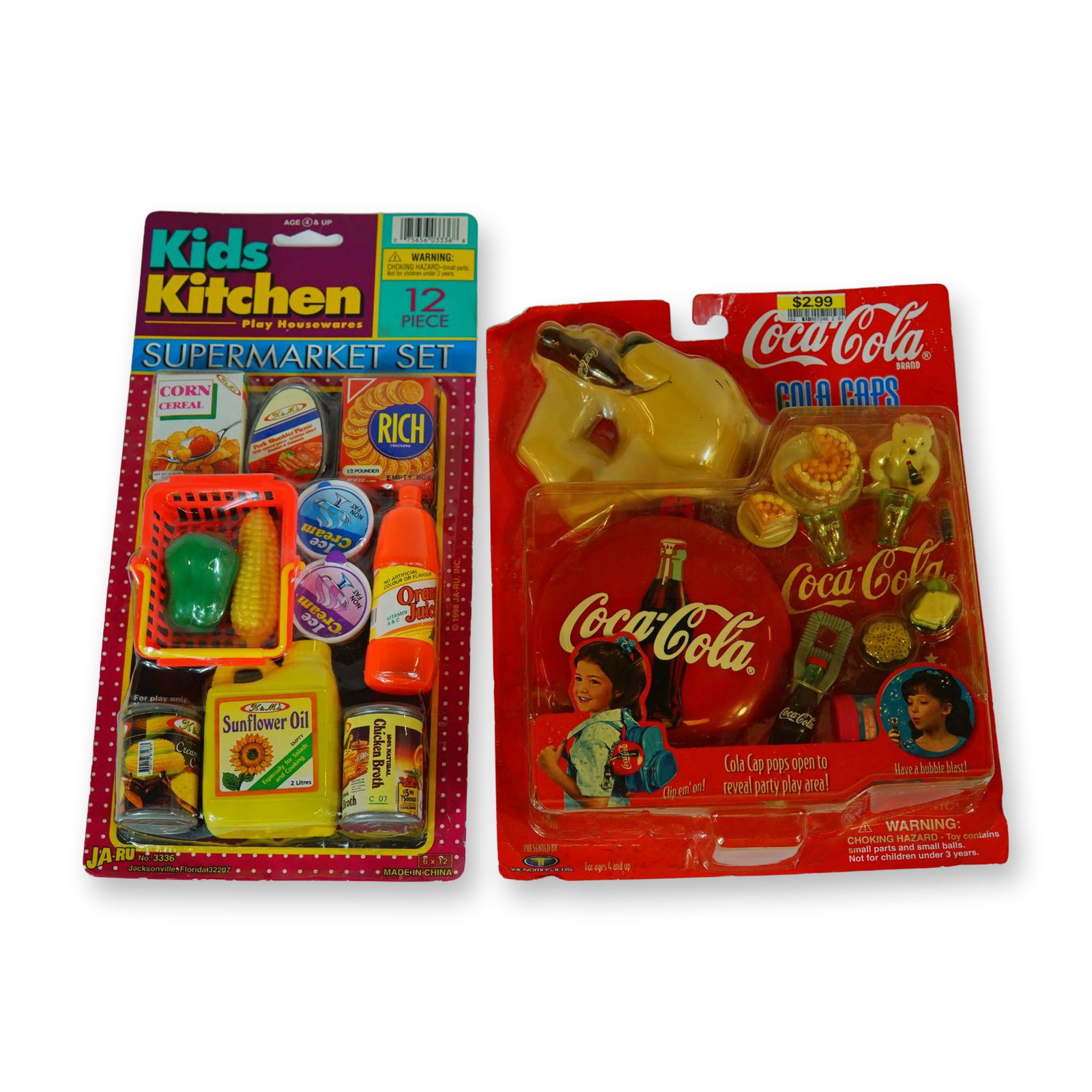 A Pair of Vintage 1998 Toy Playsets, JA-RU Kids Kitchen and Trendmasters Coca-Cola, Plastic and: This lot features two original, unopened toy playsets from 1998 representing popular play themes of the late 20th century. The first item is a Kids Kitchen Supermarket Set manufactured by JA-RU, Inc.