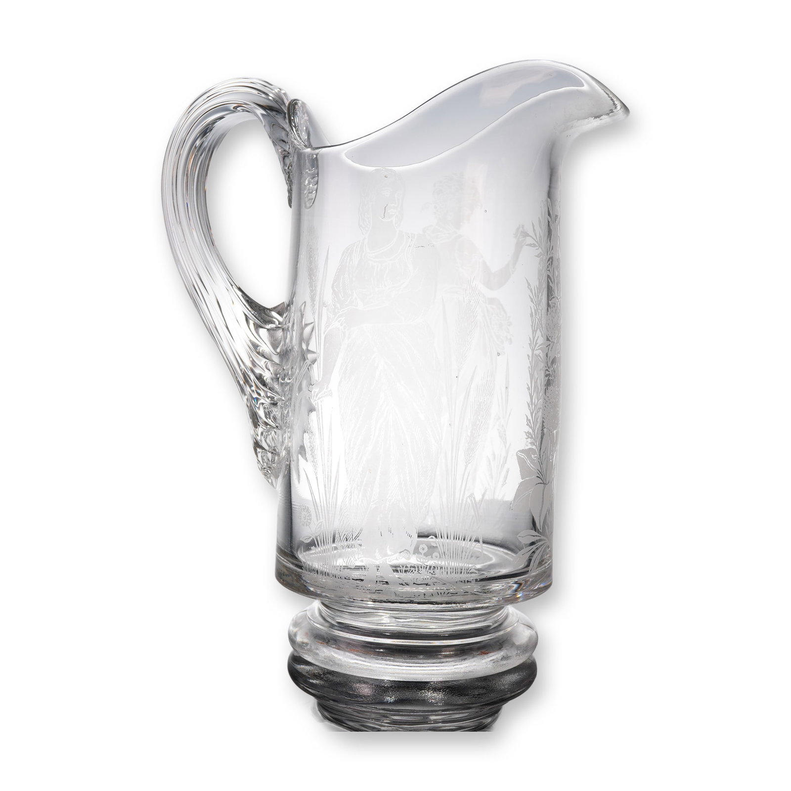 EAPG Engraved Water Pitcher w/ Greco-Roman Figures: A single clear colorless glass water pitcher, consistent with the style of Early American Pressed Glass (EAPG) production, featuring a thick, ribbed, molded foot and an applied handle. The handle is c
