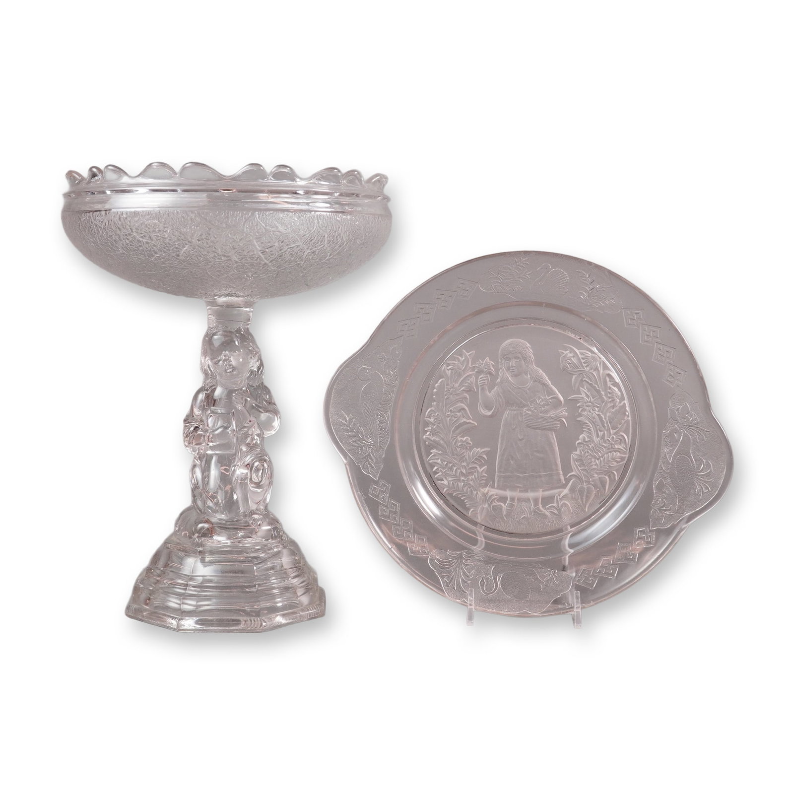 A Two-Piece Lot of EAPG Hobbs Brockunier Compote and Handled Plate: A two-piece lot of Early American Pressed Glass (EAPG) tableware rendered in a pale pink or blush amethyst hue. The collection includes a pedestal compote and a handled decorative plate. The compote i