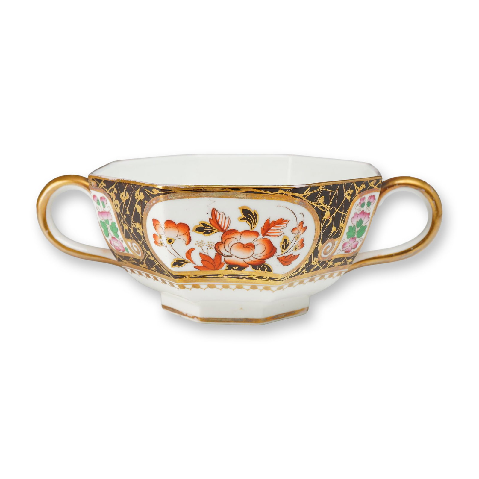 Wedgwood Imari Style Octagonal Bone China Bowl with Handles, ca. 1870: A Wedgwood bone china bowl of octagonal form with two gilded loop handles, dating to approximately 1870. The exterior is decorated in a rich Imari palette, featuring hand-painted iron-red and green en