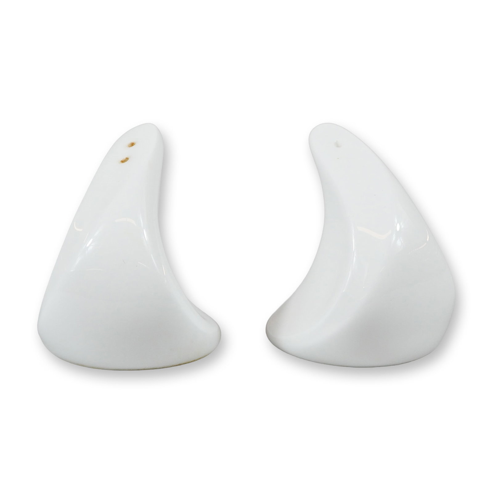 A Pair of Wedgwood Bone China Modernist Salt and Pepper Shakers: This pair of salt and pepper shakers is manufactured by Wedgwood in England. Crafted from fine bone china, the set features a minimalist, modernist design with a sculptural, organic form. Each shaker 