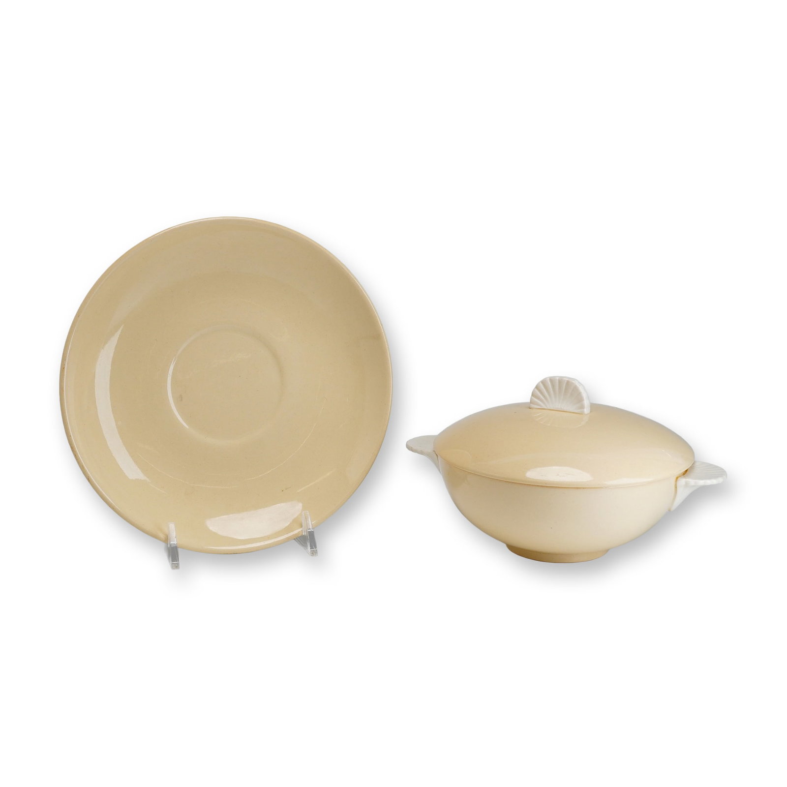 2pc Wedgwood Harvest Moon Lidded Tureen and Underplate Set, ca. 1937: Wedgwood Harvest Moon pattern two-piece lidded tureen and matching underplate set, produced circa 1937. This earthenware set features a solid pale yellow glossy glaze. The tureen has a hemispherical b