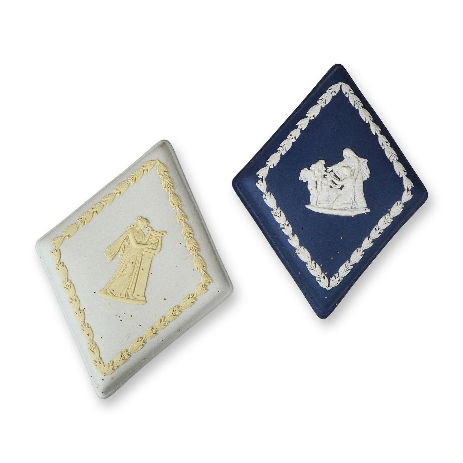 Two Wedgwood Jasperware Diamond-Shaped Trinket Boxes: This lot consists of two Wedgwood Jasperware lidded trinket boxes in a rhomboid or diamond shape. Jasperware is a type of unglazed stoneware originally developed by Josiah Wedgwood, recognized for