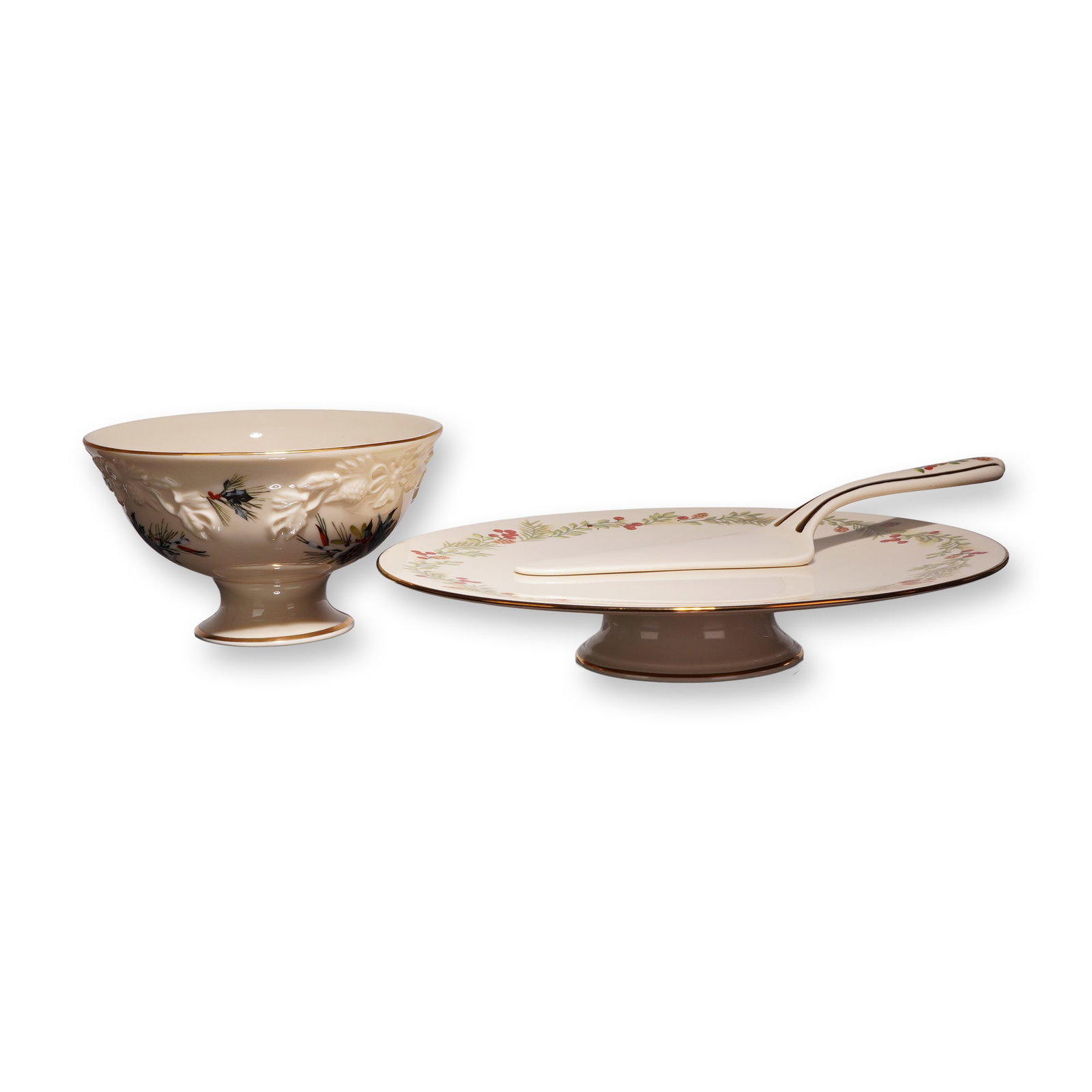 Lenox Williamsburg Boxwood and Pine Three-Piece Porcelain Tableware Set: This three-piece set of Lenox fine ivory porcelain tableware is from the Williamsburg collection in the Boxwood and Pine pattern. The set comprises one pedestal cake plate, one pie serving utensil,